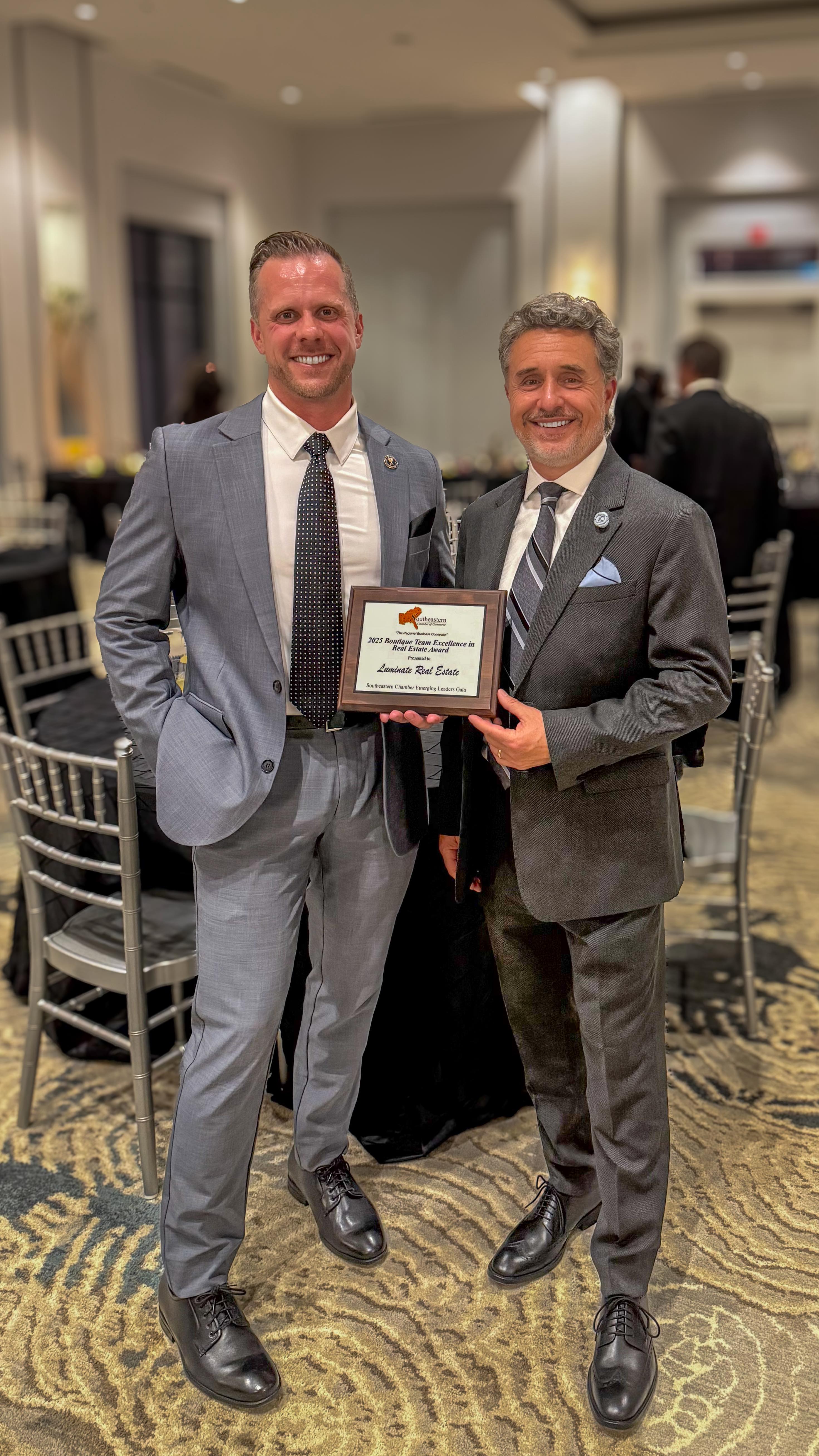 ✨ Honored & Grateful ✨
Recently, LUMINATE Real Estate was recognized by the Southeastern Chamber of Commerce with the Excellence in Real Estate Award at their 20th Anniversary Emerging Leaders Gala in Charleston, SC. It was in recognition of our leadership, modern approach to client care, and creative branding.
We’re grateful for this recognition and proud to serve our community with dedication, professionalism, and care. Thank you to our clients, partners, and neighbors who make this work so rewarding!
—Ryan and Jon