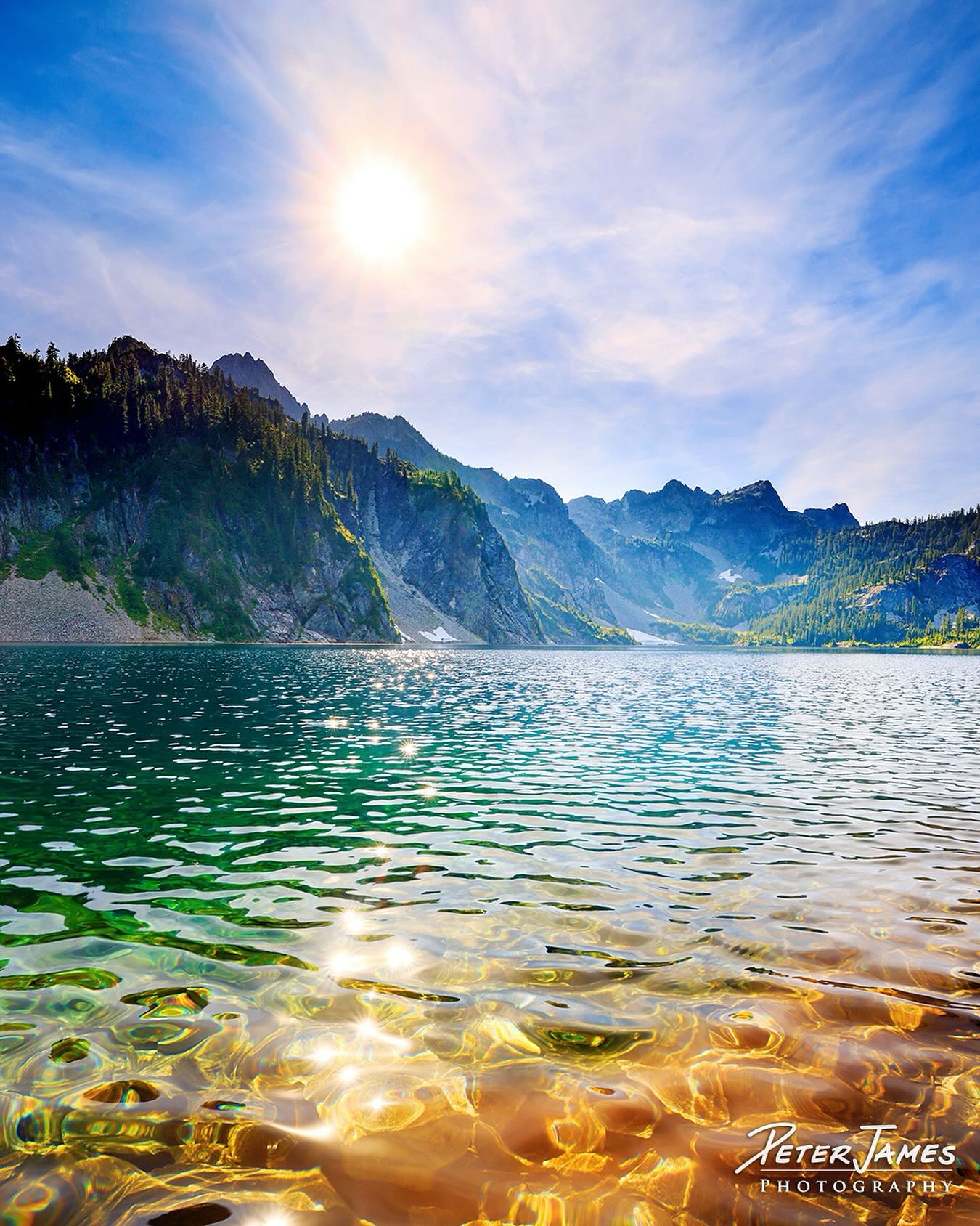 ☀️ The last golden days of summer call us back to the wild.
At Snow Lake, high atop Snoqualmie Pass, sunlight dances through crystal waters, sketching patterns across the surface and lakebed alike. A reminder that even in stillness, nature is always alive with movement and light.
✨ May these fleeting summer moments stay with you as daily inspiration.
Discover more windows into wilderness at our galleries in Bellingham and Leavenworth.
⸻
#lastdaysofsummer
#SnowLake #SnoqualmiePass #WashingtonNature #PNWWonder #PNWPhotography #NatureArt #WildernessWindows #PacificNorthwestBeauty #FineArtPhotography #GalleryExperience #BellinghamGallery #LeavenworthGallery #PeterJamesPhotography #NatureCollectors #NatureSanctuary