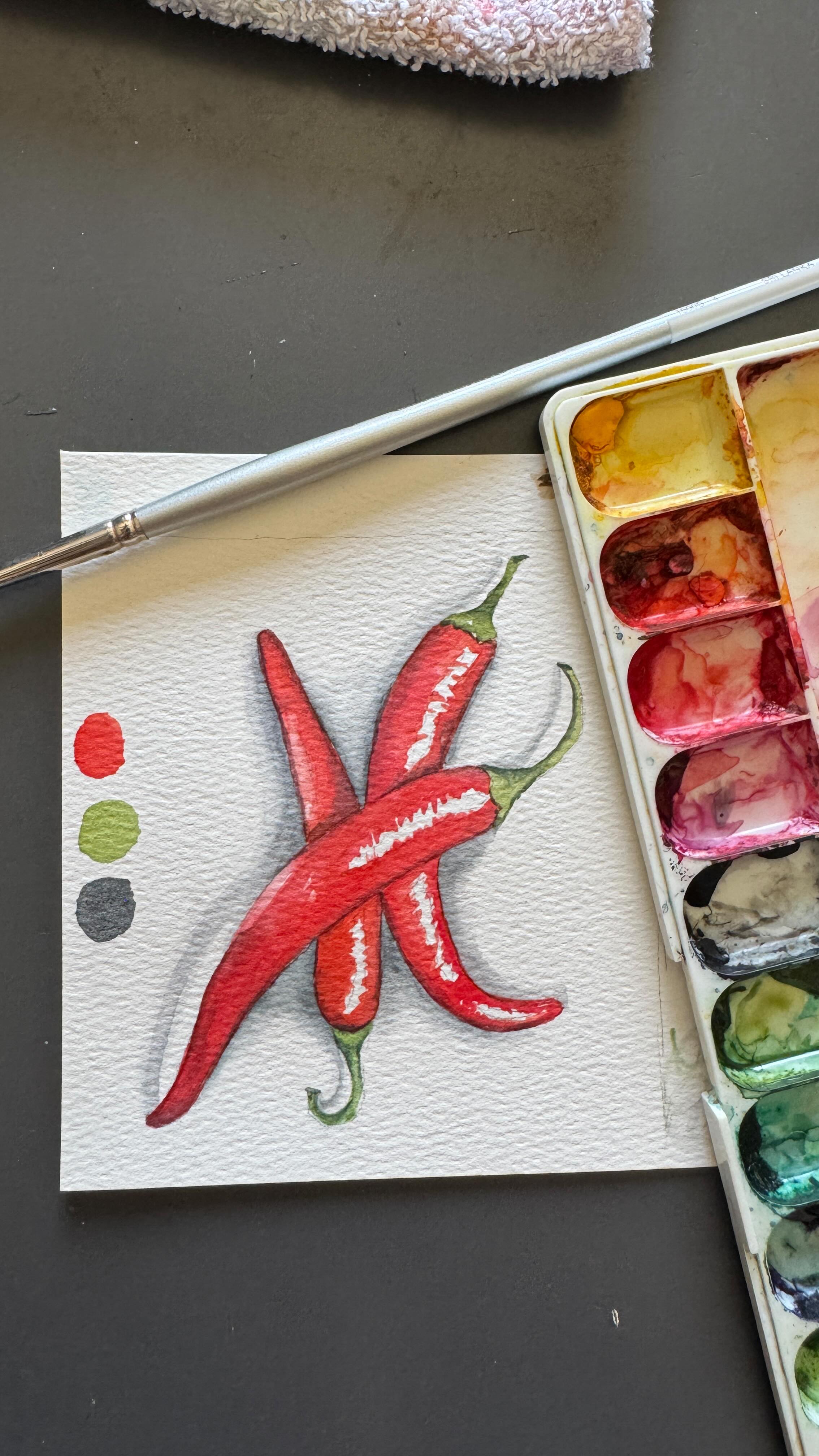 Chili Peppers 🌶️
✔️ Orange red
✔️ Olive green
✔️ Payne’s grey
Keep the highlights the color of the paper
Paint medium or mid tones in a warm red
Add shadow color with payne’s grey mixed with red on peppers
Use olive green and payne’s grey for stems.
Payne’s grey for shadows.
#watercolorart #watercolorchilis #chilis #paintingforfun