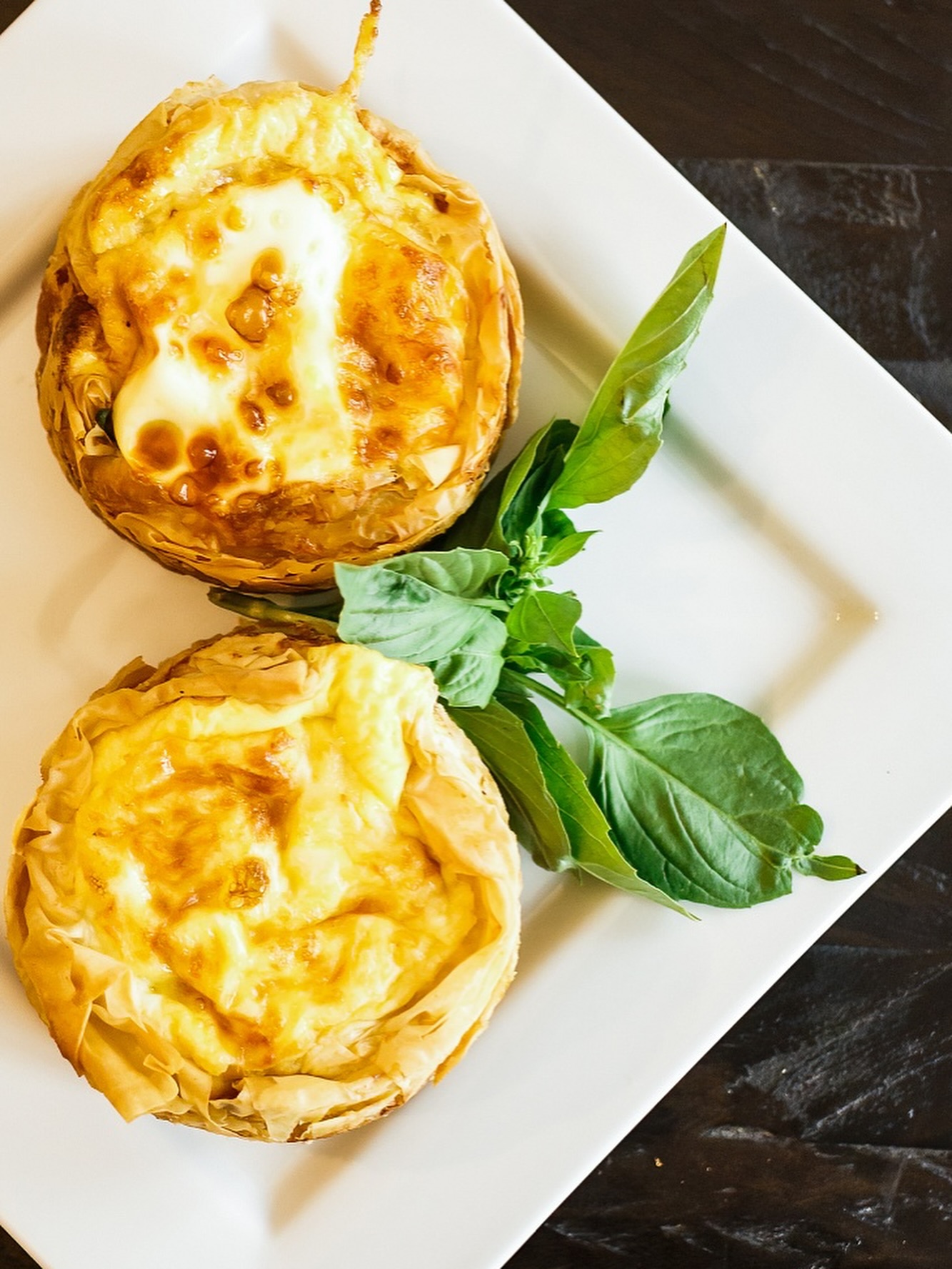 The secret to a perfect breakfast? A delicious homemade Fritatta. Here’s my favorite recipe! 🍳
Ham and Egg Frittata
Ingredients:
8 large eggs
1 cup diced cooked ham
1/2 cup shredded cheese (cheddar, gruyere, or your preference)
1/4 cup milk or heavy cream
1 small onion, diced
2 tablespoons olive oil or butter
2-3 tablespoons fresh herbs (chives, parsley, or thyme)
Salt and pepper to taste
Optional: 1/2 cup diced bell peppers or spinach
Instructions:
Preheat your oven to 375°F (190°C).
Prepare the eggs: In a large bowl, whisk together eggs, milk, salt, and pepper until well combined.
Cook the vegetables: Heat olive oil in a 10-inch oven-safe skillet over medium heat. Add diced onion (and bell peppers if using) and cook for 3-4 minutes until softened.
Add ham: Stir in the diced ham and cook for another 2 minutes to warm through.
Combine: Pour the egg mixture into the skillet. Gently stir to distribute the ham and vegetables evenly. Sprinkle cheese and herbs on top.
Cook on stovetop: Let the frittata cook on the stovetop for 3-4 minutes without stirring, until the edges begin to set.
Finish in oven: Transfer the skillet to the preheated oven and bake for 12-15 minutes, until the center is set and the top is lightly golden.
Rest and serve: Let cool for 2-3 minutes before slicing. Cut into wedges or serve whole and enjoy! ☕️🐣