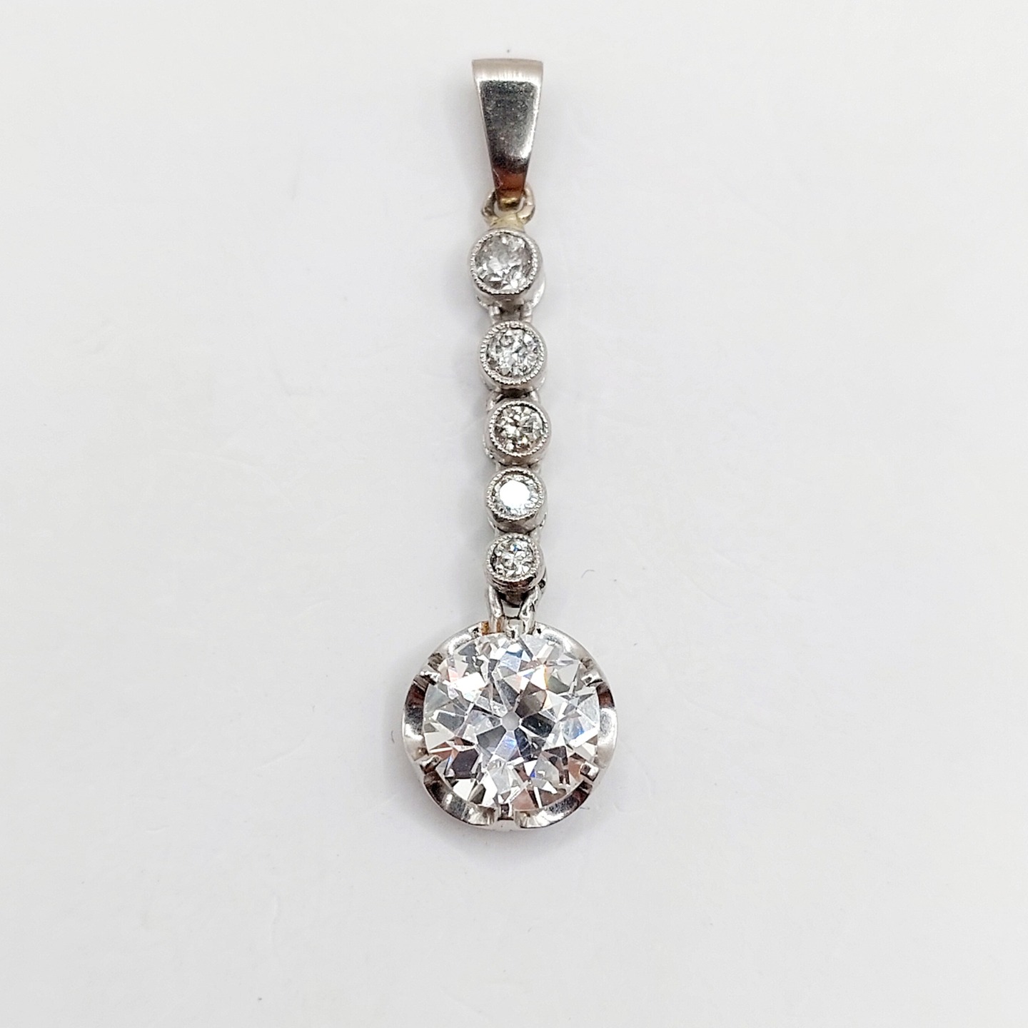 French antique pendant 18k white gold and platinum set with a 1.30 carats old european cut diamond topped by a row of small diamonds (circa 1900)
PRICE : 2700€
Magnificent antique French work (old solitaire sleeper earring transformed into a pendant)
Size: 31 x 8.5 mm (including bail)
Weight: 1.98 g
Diamond size: approximately 7/7.1 mm (estimated at 1.30 carats) Old European cut
Diamond in good overall condition (some micro-chips almost invisible under a magnifying glass), white in color, with a few small inclusions visible under a magnifying glass only
Secondary diamond size: approximately 2.3/2.5 mm
Hallmarks erased by the modification
#diamond #artdeco #artdecocharm #goldcharm #goldpendant #frenchjewelry #frenchjewellery #oldminecut #oldminecutdiamond #daisycharm #oldeuropeancutdiamond