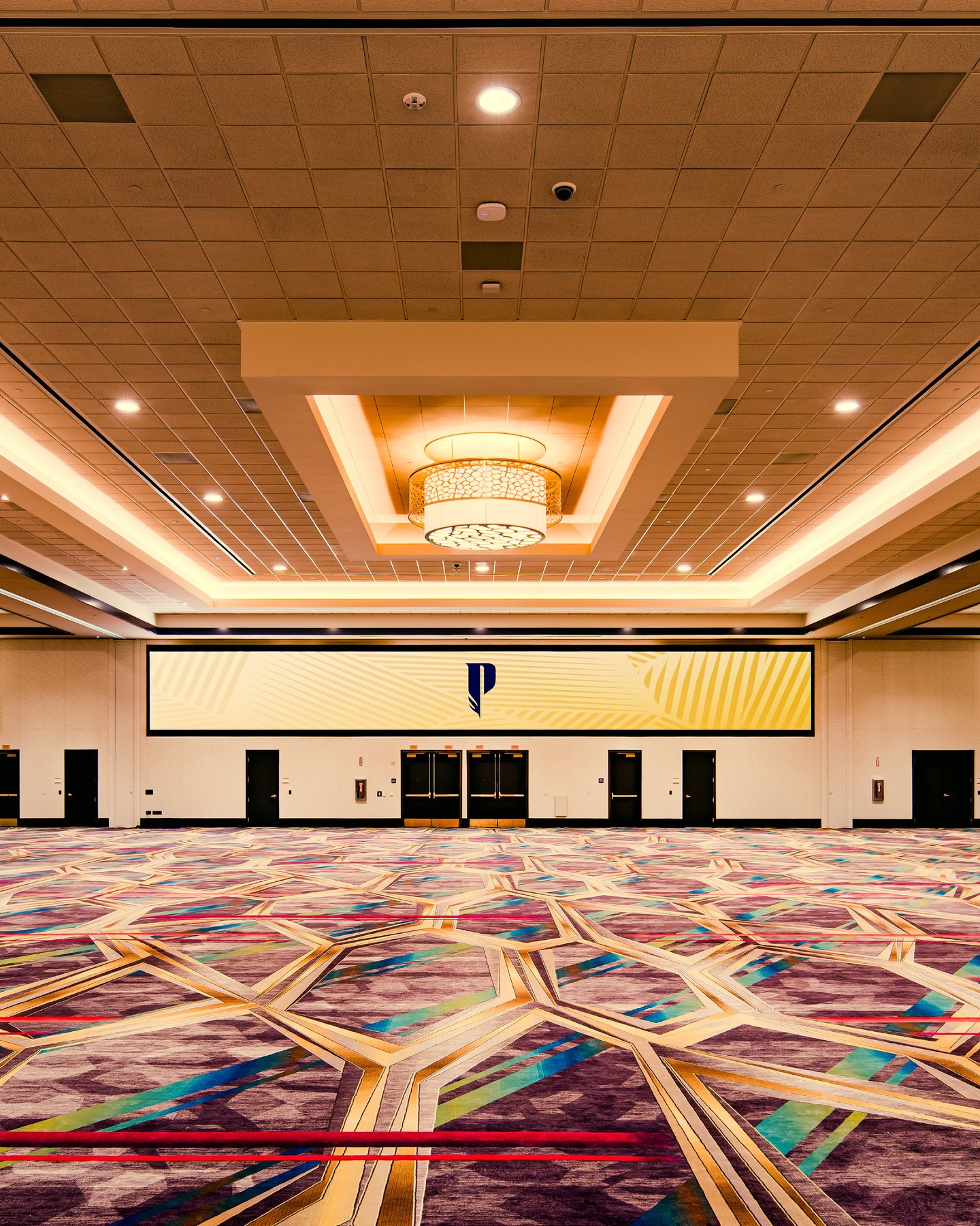 Pechanga Resort Casino's Grand Ballroom shines brighter than ever after a six-month renovation! This 30,000-square-foot space now boasts nearly 150 feet of LED screens, fresh carpeting and lighting, refreshed interiors, and cultural displays that beautifully showcase the tribe's heritage. Designed by Klai Juba Wald Architecture + Interiors, the space blends tradition, tribal and modern elegance seamlessly. Featured here is our stunning woven Axminster and ColourOptics Print carpeting.
📸: @pechangacasino 
Click the link in our bio to see MORE images of this project! 
•••
#CouristanHospitality #HospitalityStrong #HospitalityCarpet #HospitalityDesign #CustomCarpets #CarpetDesign #Custom #HotelDesign #DesignExperts #PechangaResortCasino ##klaijubawald