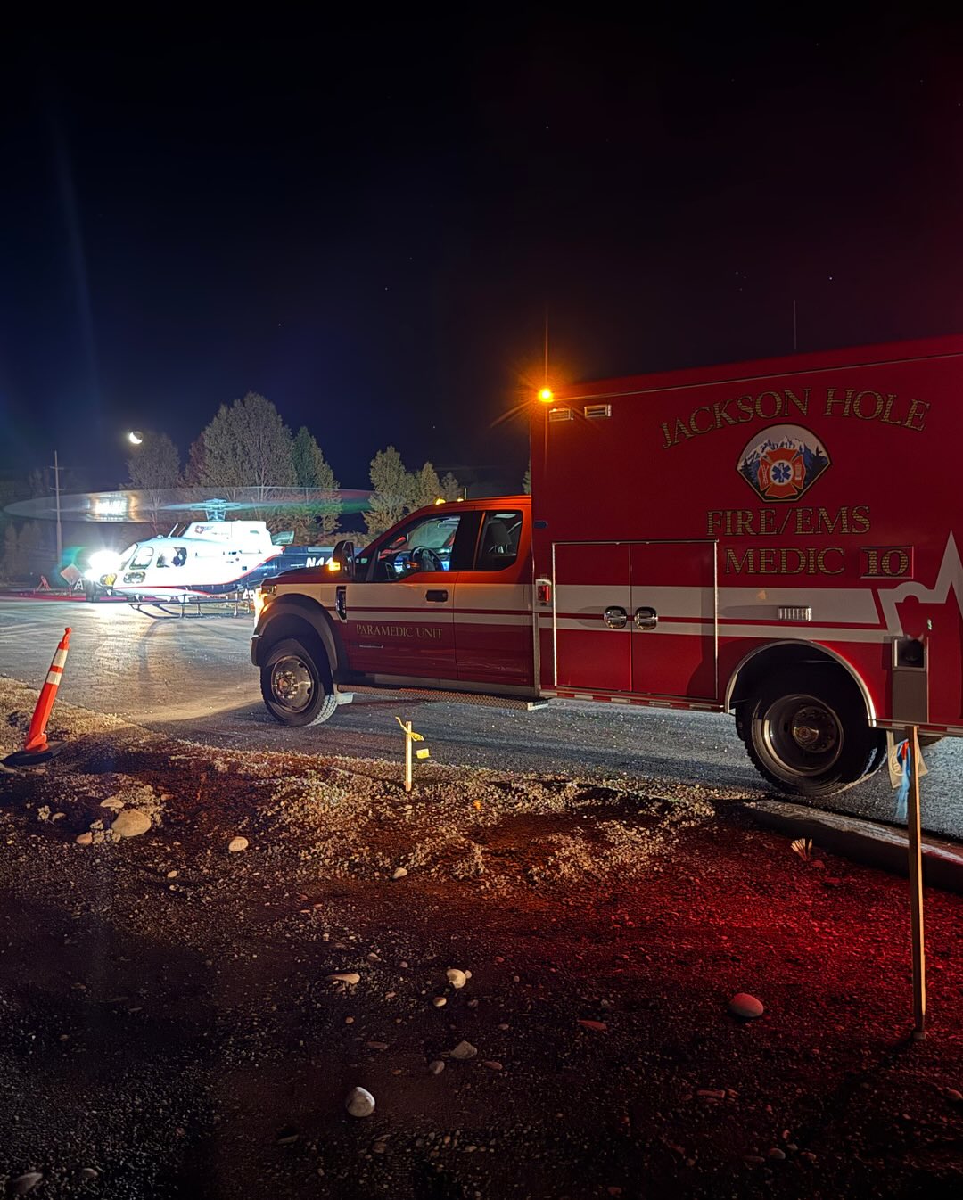 🔥 Overnight on Teton Pass: Just after midnight, a car-hauler truck crashed and erupted in flames about 100 ft off Hwy 22. One of the three vehicles onboard was electric, increasing the fire risk.
🚒 @jh_fire_ems firefighters quickly knocked down the blaze, preventing it from spreading to nearby trees and brush.
🚑 Sheriff’s deputies @tetonwysheriff and Fire/EMS personnel @jh_fire_ems located and stabilized the patient then transferred to Teton County Search and Rescue @tetoncountysar (TCSAR). The SAR team packaged the patient in a wheeled litter and used a 300-foot rope system to lower them down the slope to the Parallel Trail. From there, they transported the patient approximately a quarter mile to the Old Pass Road trailhead. The driver was treated on scene by @jh_fire_ems medics and then air-lifted by Air Idaho to Eastern Idaho Regional Medical Center.
🔥 A Teton Interagency Fire crew checked for hotspots early Tuesday, and @jh_fire_ems remains on scene for wildfire suppression and will assist with vehicle and debris removal. @wyominghighwaypatrol is currently investigating the incident.
🙏🏼 We’re grateful for the swift, coordinated response from all agencies involved in keeping our community safe.
📸: @jh_fire_ems
#jacksonhole #tetoncounty #tetonpass #firstresponders #jhfireems #jhfireemsfoundation #hwy22
