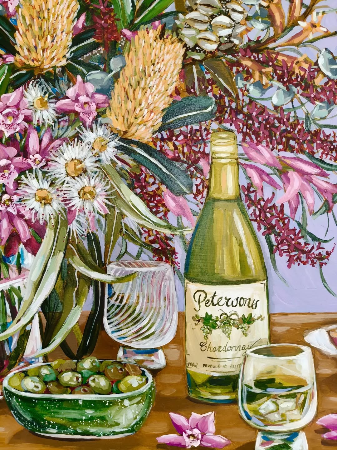 A cropped detail of another surprise commission from earlier this year:
Some siblings banded together to get their mum a 70th birthday painting - it featured sentimental orchids, her favourite wine, nostalgic wine glasses and their favourite family dip with olives. You can't see it in this photo, but it also included her blue kitchen cupboards that were about to be renovated. A very special piece to celebrate a milestone birthday.
This one was MONTHS and months in the making and it nearly didn't arrive in time 🫠 - it got caught up in the postage delays around the time of the Brisbane cyclone (the one that never eventuated).
Luckily it all worked out in the end!
#painting #stilllifepainting #australianartist #australianflowers #commission #customart