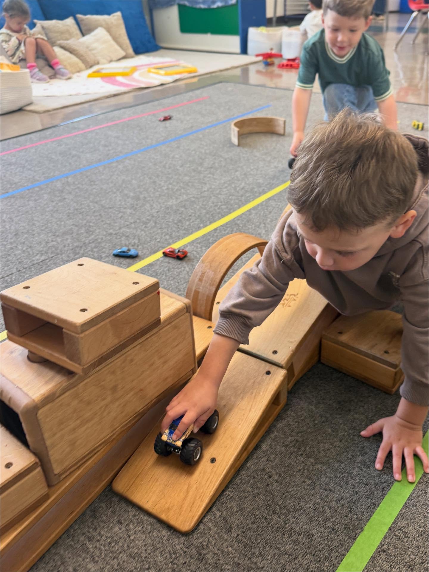 Today’s block play went from a car track to a treehouse with lots of teamwork to keep it steady.