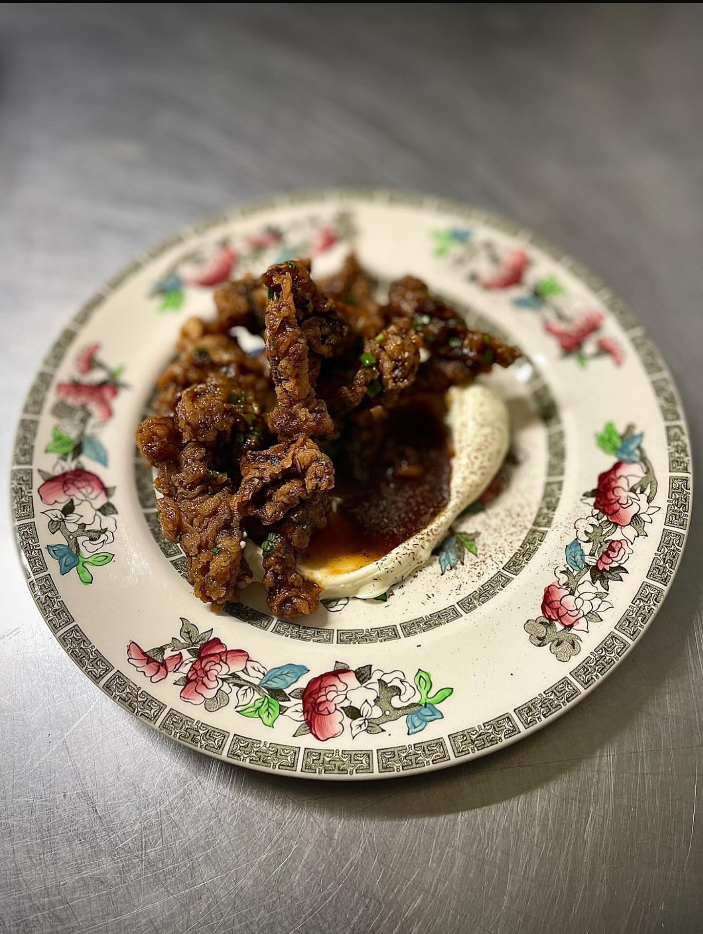 Crispy beef, cheese sauce, lea & perrins sauce