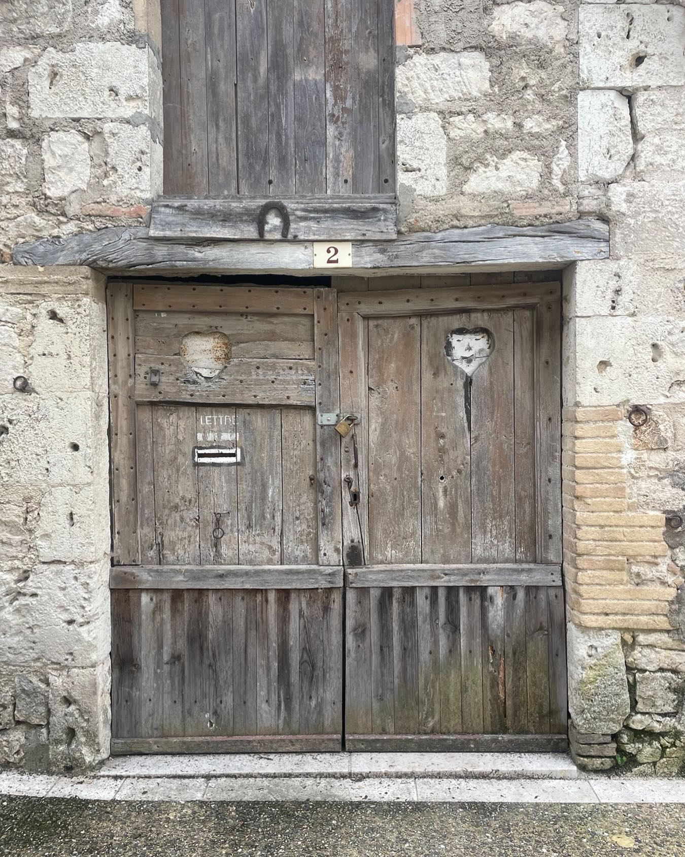Adding to my collection of doors, see this spotted whilst in France recently. The door studs date back to medieval times where the invaders axes would be blunted should they try to enter without permission. Note also the rather scary face looking out.