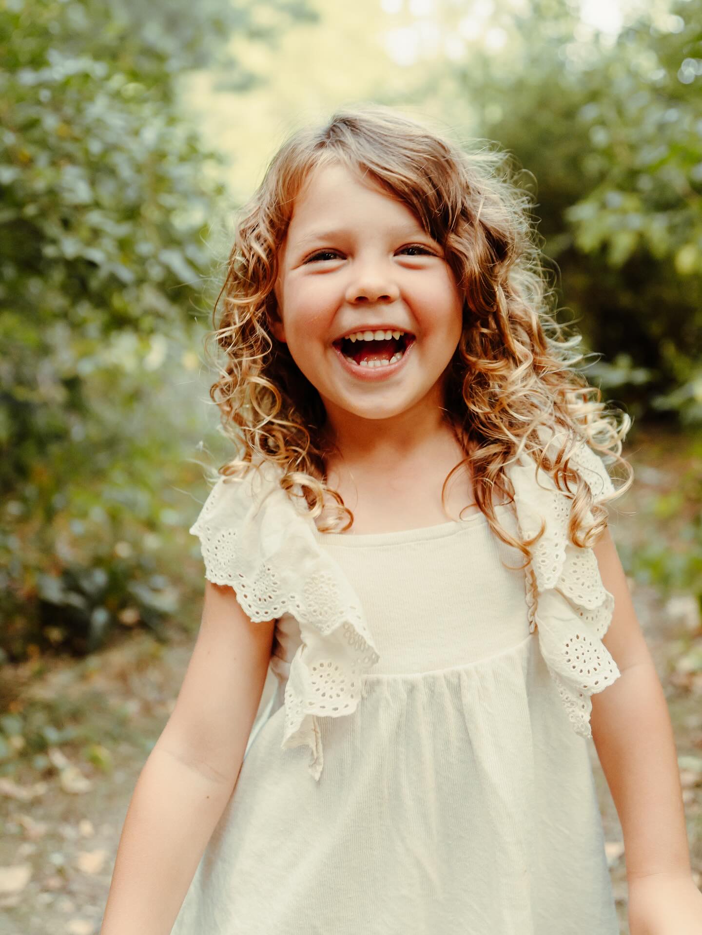 When you have a dance party while taking individual portraits at an extended family session your photos may turn out something like this! I love how you can see their personalities shine through these photos, my friends have some cute kids!