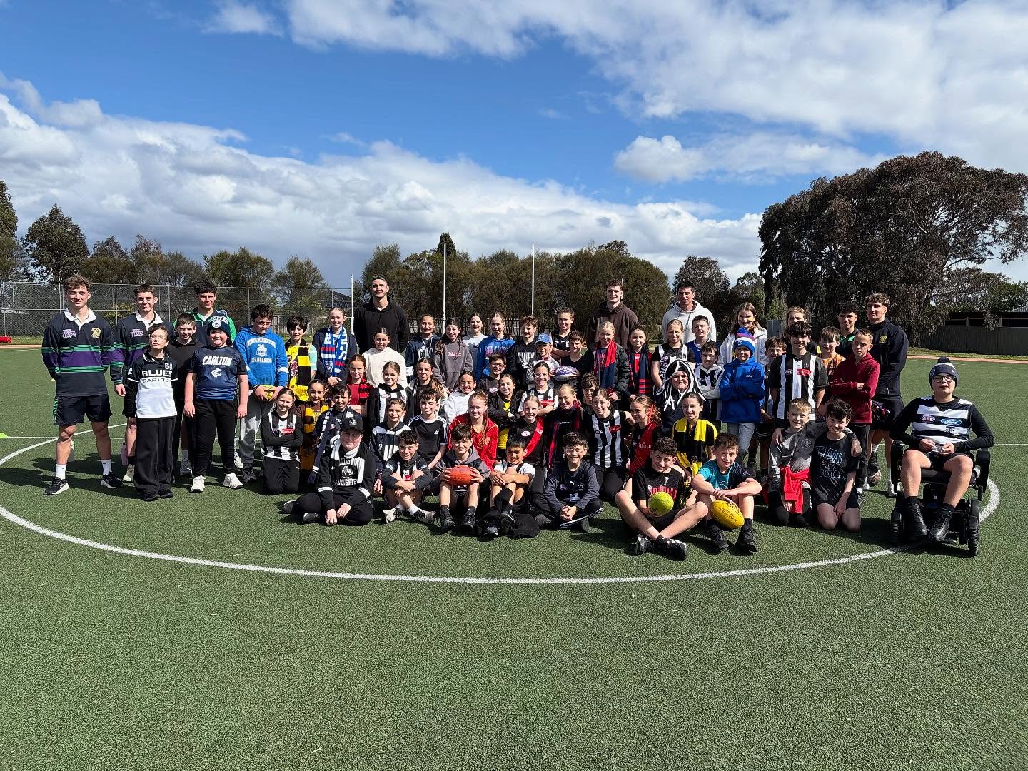 FOOTY DAY!
The school was alive with colour as students proudly dressed in their team colours and took part in a variety of football-themed activities. Out on the oval, clinics had everyone kicking, marking, and handballing with plenty of enthusiasm. We were especially fortunate to be joined by Matt K and his club mates, along with volunteers from Parade College and Loyola College, who guided and encouraged our students throughout the day.
Inside the classrooms there was just as much excitement, with games, art, and other activities adding to the fun. A huge thank you to our PFA for organising the special lunch orders and the donation of footballs to raffle off in each classroom.
We are so grateful to our staff, volunteers, and students for their energy and teamwork, which made the day a wonderful celebration of sport, community, and school spirit.