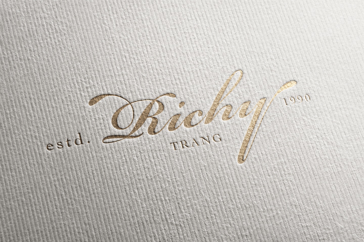 Project: Richy Trang
Designed by: Farg Design Studio
Richy Trang Branding Design Project
Richy Trang is a renowned confectionery brand from Trang Province, established in 1990. For decades, it has been cherished by the local community and widely recognized for its quality and craftsmanship. The heart of the brand lies in the owner’s dedication and meticulous attention to every detail in the art of making sweets.
Beyond her culinary passion, the owner is also deeply fond of flowers, earning her the nickname “Magnolia”—a flower with strong petals yet delicate stamens, symbolizing grace and refined softness within strength.
For the brand’s key visual, we incorporated the magnolia flower along with the Sri Trang flower, the provincial flower of Trang, to capture a unique local identity. This is further enhanced with contemporary graphic language and soft pastel tones, creating a gentle and inviting atmosphere that reflects the delicate sweetness of every Richy Trang creation.
—
ผลงานออกแบบอัตลักษณ์ของแบรนด์ Richy Trang
Richy Trang คือแบรนด์ขนมชื่อดังจากจังหวัดตรังที่ก่อตั้งมาตั้งแต่ปี 1990 อยู่คู่กับผู้คนในจังหวัดตรังมาอย่างยาวนาน และเป็นที่รู้จักอย่างกว้างขวาง จุดเด่นของแบรนด์เกิดจากความพิถีพิถันและใส่ใจในทุกรายละเอียดของการทำขนม โดยมีเจ้าของร้านผู้เปี่ยมด้วยความรักและความหลงใหลในศิลปะแห่งรสชาติ
นอกจากนี้ เจ้าของร้านยังเป็นผู้ที่ชื่นชอบดอกไม้เป็นพิเศษ จนได้รับฉายาว่า “ดอกแมคโนเลีย” ซึ่งเปรียบได้กับกลีบที่แข็งแรงแต่เกสรอ่อนนุ่ม สื่อถึงความละเมียดละไมที่ซ่อนอยู่ภายใต้ความสง่างาม
สำหรับการออกแบบ Key Visual ของแบรนด์ เราได้นำ ดอกแมคโนเลีย มาผสานกับ ดอกศรีตรัง ซึ่งเป็นดอกไม้ประจำจังหวัดตรัง เพื่อถ่ายทอดเอกลักษณ์ความเป็นท้องถิ่นที่มีเสน่ห์เฉพาะตัว พร้อมทั้งเลือกใช้ภาษากราฟิกที่ร่วมสมัยและโทนสีพาสเทล เพื่อสร้างบรรยากาศที่อ่อนโยน อบอุ่น และสะท้อนถึงความละมุนละไมในทุกชิ้นขนมของ Richy Trang