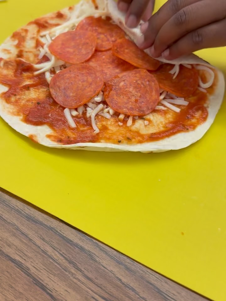 🚨 New snack alert! 🚨 Our little chefs whipped up these cheesy pepperoni pinwheels 🌀🍕—and trust us, they disappeared fast! #FunFoodExplorers #NewSnack #KidsInTheKitchen #pizzalovers