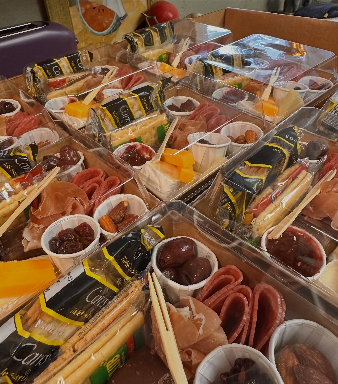 Delivery day! Our charcuterie boxes are stocked & stacked 🤗 #friday #weekend #catering #orders #cheflife