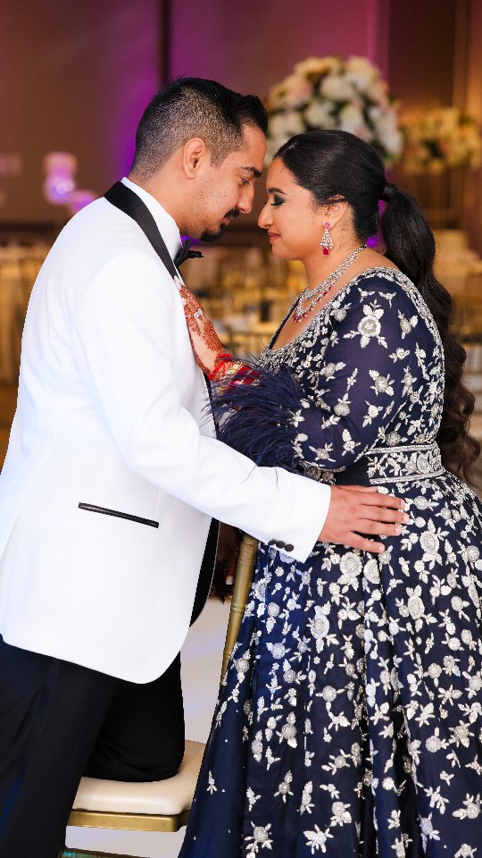 A custom midnight-blue gown with a graceful removable trail, adorned with intricate silver embroidery. The flowing silhouette carried an air of regal elegance, while the shimmering details added a chic, modern edge—an unforgettable reception look for our beautiful bride Riddhi.
Bride:@riddhipatel_goomar
Outfit:@crossoverchicago
Photography:@shanphotographyinc
Planner:@j2revents
Henna:@hennabyparvin_
To design your bridal or partywear outfit
Email:mandeep@crossoverchicago.com
#CrossoverChicago #reception #receptiongowns #bluegown💙 #indianbride #southasian #southasianbride