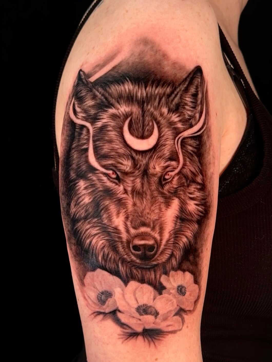 A feminine, badass wolf for @jsparkpn 🐺
Done in June 2025
Learning Moment #3: As a new tattoo artist, I know that I’ll forever be indebted to the power of social media. My mentor stressed the importance of it to me right away: “You can be a top-notch, highly-skilled tattooer and STILL be hurting for work if you don’t market yourself enough.” To make sure I fully leaned in, my mentor required me to post 3-4 reels every week as an apprentice (and I never missed a mark). As some of you know, I documented my entire apprenticeship journey through daily and weekly vlogs where I shared every errand, assignment, and tattoo that I did. And the more I tattooed, the more progress and content there was for me to share. I also had to throw in some silly videos because it’s fun to make people (even if it’s just myself) laugh. 
About 5 months into my apprenticeship, it was obvious that my videos were working. I had appointments every day, 6-7 days a week. My mentor would always cheer me on and tell me that what I was doing wasn’t normal. “It’s hard to gain people’s trust when you’re first starting out, so most apprentices would be sitting at the shop drawing or practicing on fake skin.” And that most likely would have been me if it wasn’t for my social media reach. I’m so thankful for every person who found my videos, took a risk, and let me practice on them. 
I know some tattooers really hate creating content, but I actually love it. It’s a fun way to share my work and a little about myself at the same time. It gave me the craziest jump start I could have ever asked for as a newbie to this industry. So if it keeps me busy with fun projects, it’ll always be a win-win in my book. 
TLDR: post the damn video!
#tattoo #tattooartist #arizonatattoo #arizonatattooartist #femaletattooartist #ink #inktherapy #tattooideas #blackandgreytattoo #blackandgreyrealism #wolftattoo