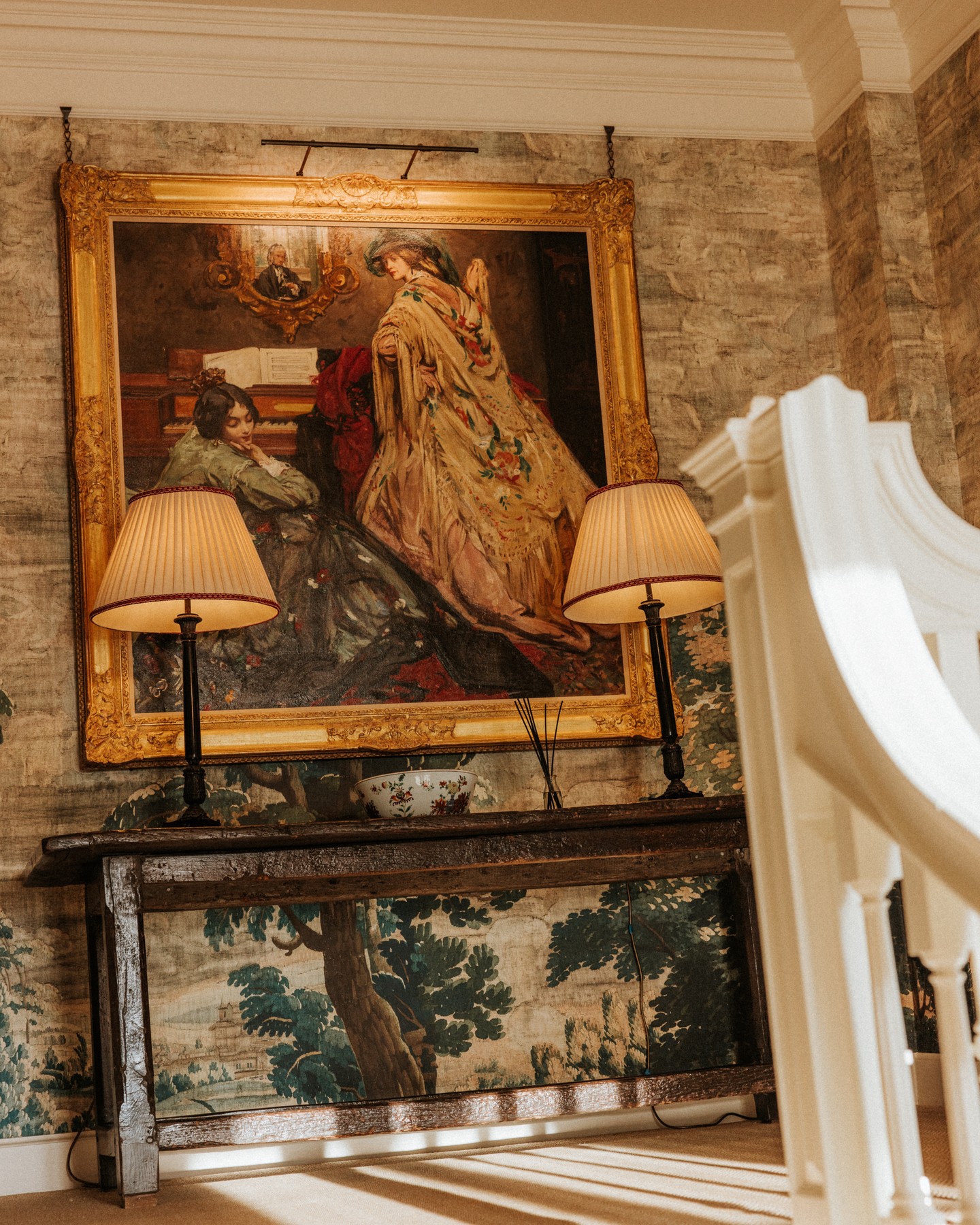 On your way to the upstairs drawing room at Coombe End Manor, you'll be greeted by these lovely ladies. Their timeless elegance adds to the journey, setting a sophisticated tone for the gathering to come.