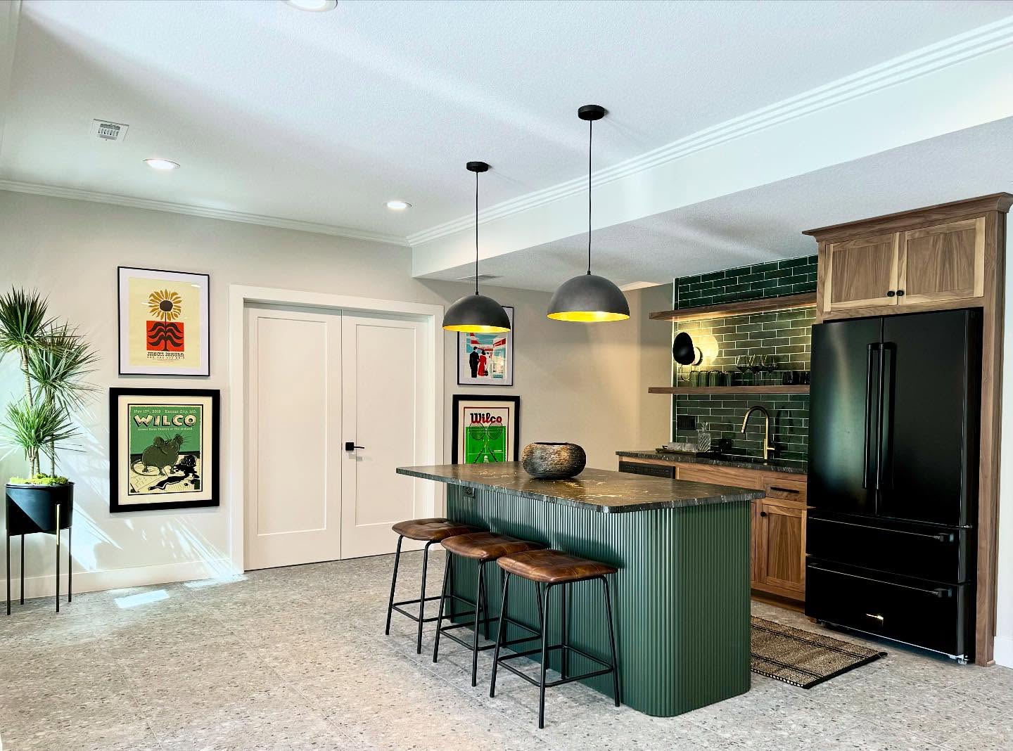 This renovation was a down to the studs, moving walls to create a new bedroom, a workout room, and a full bar kind of project. The clients wanted a fresh, modern new space to entertain, provide a place for family time and add value to their home. By changing the layout and adding stylish finishes in keeping with their personal aesthetics, I believe we succeeded! It was a joy to create this space that they will enjoy for years to come. So grateful for my clients and their trust.