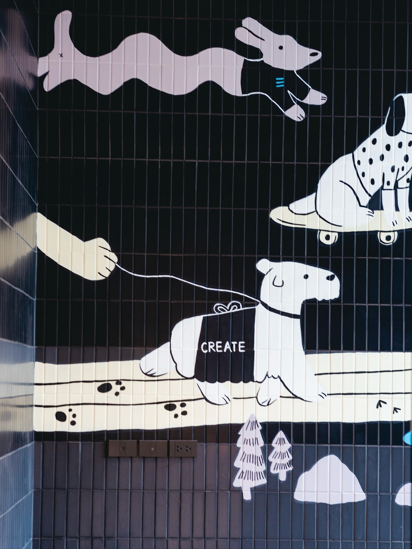 Project: Noble Create
Designed by: Farg Design Studio
Painted by: Farg Design Studio
We are also residents of @noble_development , and we truly admire this brand. Today, we had the opportunity to collaborate, and we’re very delighted to create artwork on the walls of the pet spa room at Noble Create.
Since the walls are dark gray tiles, the client requested a painted design that would soften the overall atmosphere to better suit the room’s function. Our team designed the graphics and mapped the artwork directly onto the wall.
For this project, we used VR to project the draft design instead of a traditional projector. Given the limited space at the site, VR turned out to be a perfect solution.
Our team will continue to enhance our mural painting process by integrating new technologies to make our work smoother and more precise.
A big thank you to Noble Create for trusting Farg Design Studio with this project. We look forward to working together again in the future!