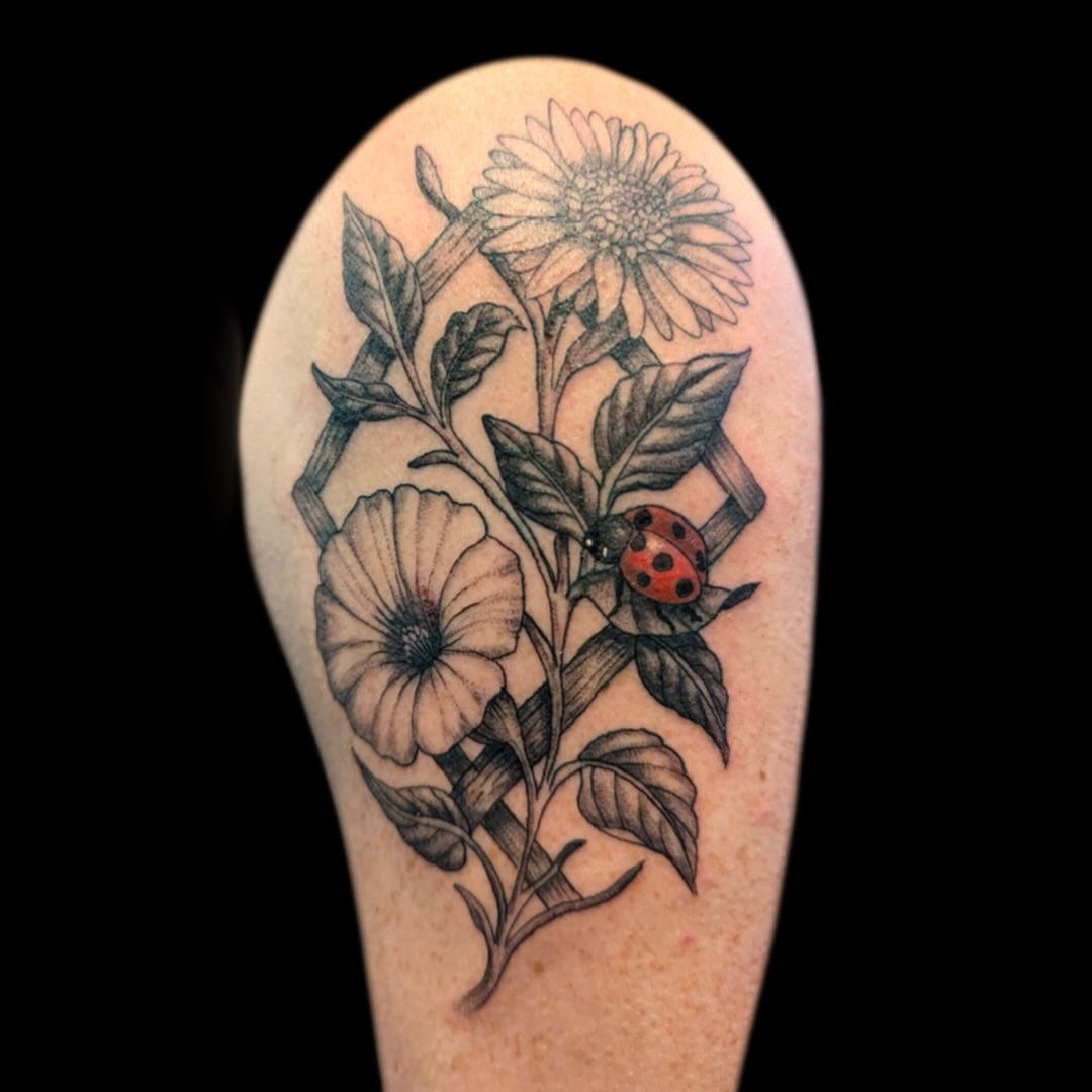 Floral piece done by @jakenbake_tattoos