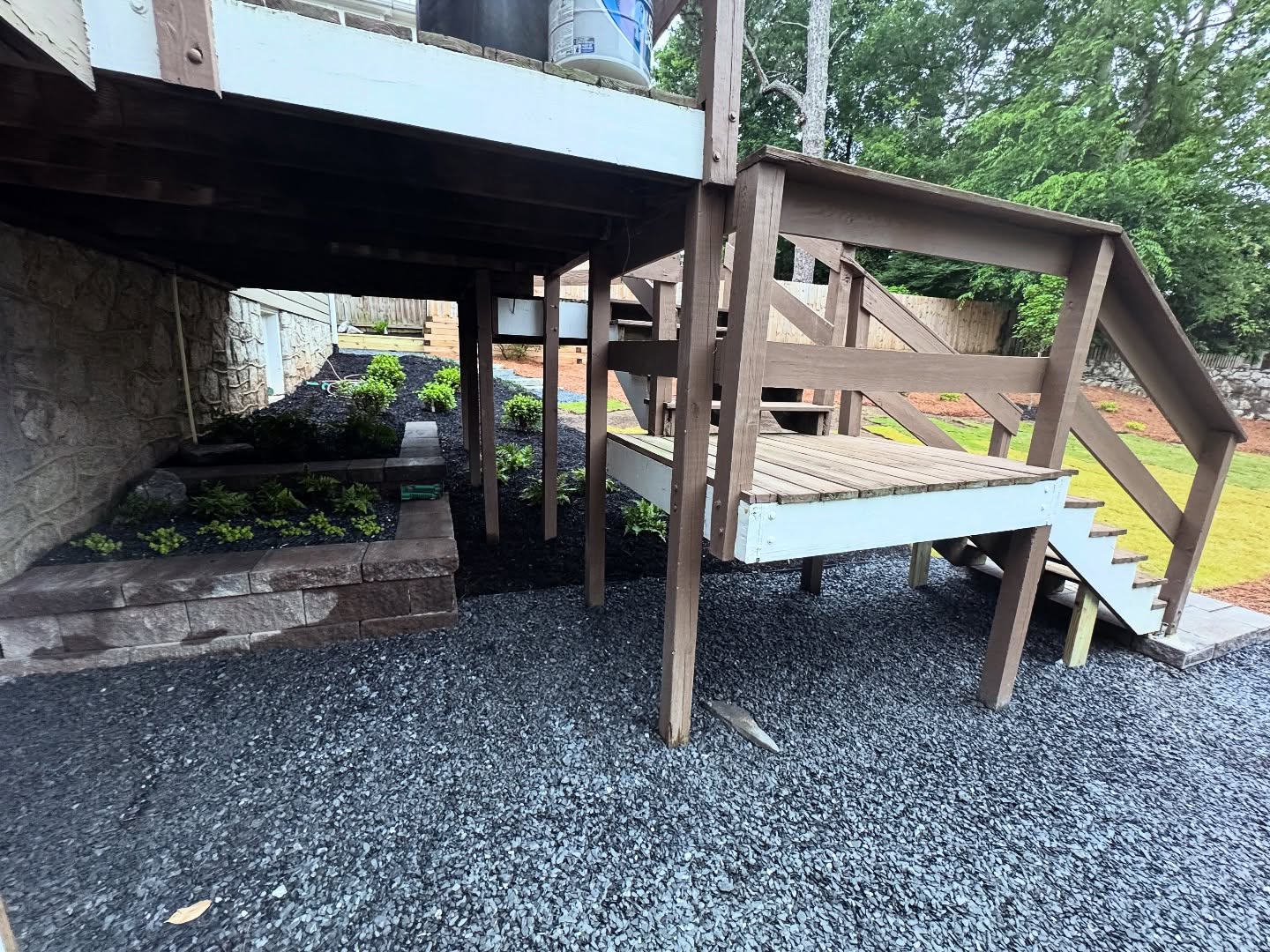 One of our favorites. This project was beautiful, cost effective, and will require minimal maintenance for these homeowners. We solved all of the drainage issues that are common to Atlanta homes (everybody’s water draining into everybody’s yard) and then revamped this entire space. Retaining walls, new deck landing, zoysia sod, plants, steps, and path. ✅✅✅