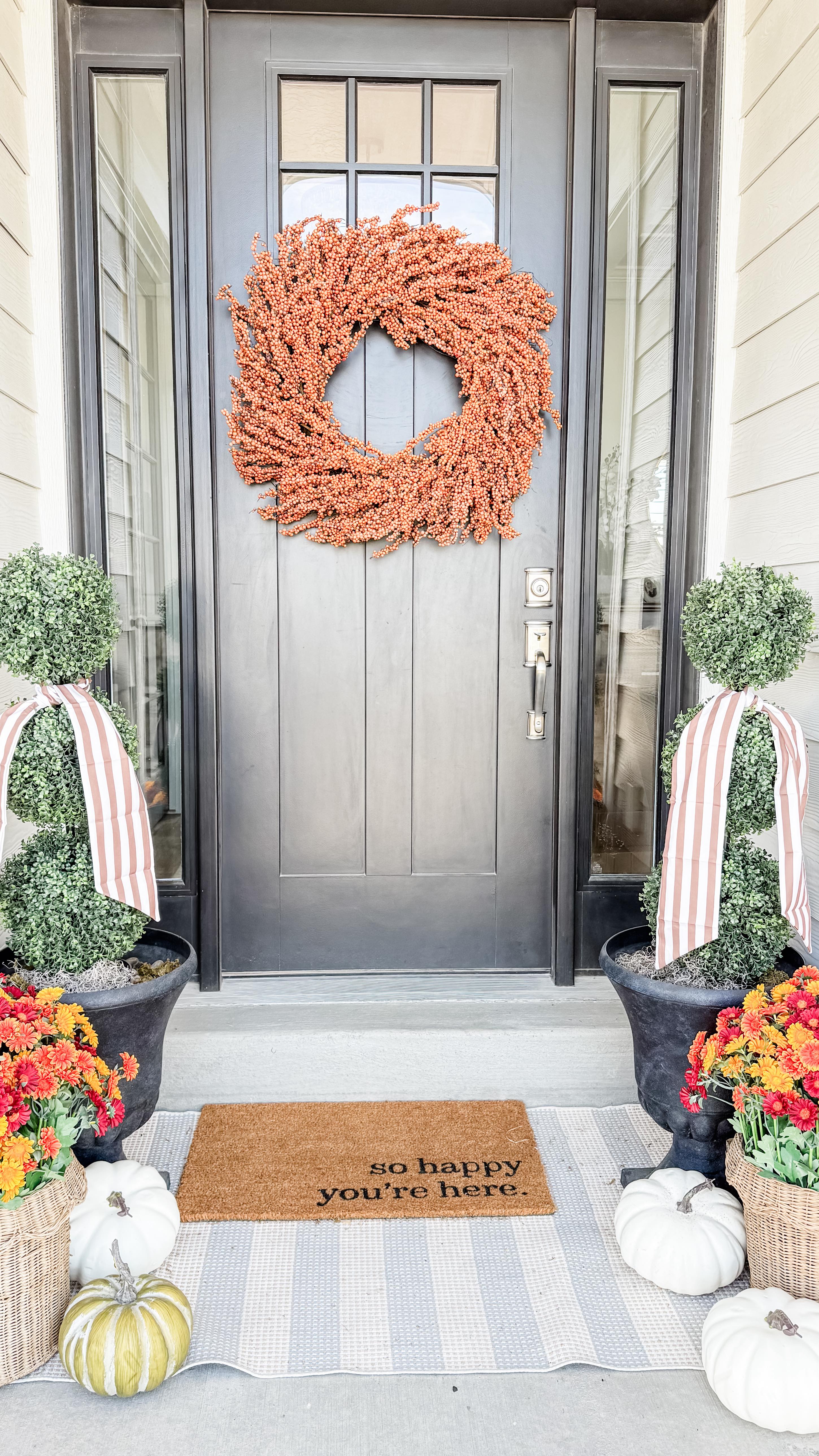 There’s nothing quite like the feeling of welcoming fall right at your front door! This year, I layered a mix of real and faux pumpkins with mums and seasonal greenery to create that collected, effortless look. The perfect finishing touch? Classic fall sashes tied around my topiaries — a simple detail that makes the whole space feel warm and inviting. Sometimes it’s those little layers that truly set the tone for the season.
#FallFrontPorch #PumpkinSeason #FallDecorInspo #CozyHomeVibes #AutumnPorch #HomeWithStyle #FallVignettes #StyledForFall #PorchGoals #fall #falldecor #falldecorations #falldecorating #frontporchdecor #frontporch