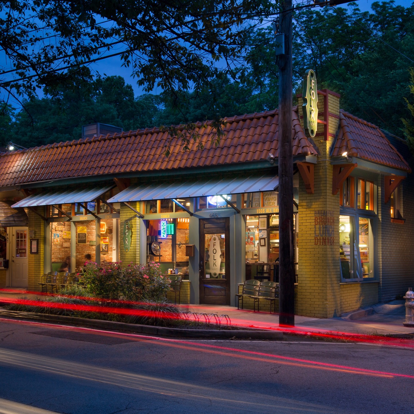 As we recently highlighted with our Boone project, at KUA, we believe that the strength of a neighborhood is built not just on housing, but on the local places that bring people together.
As another example of this, lets take a look into our project archives from 2014: Our @folkart_inmanpark project is a celebration of KUA’s vision. The project revitalized a corner of the Inman Park community with small-scale retail that supports walkability, local entrepreneurship, a sense of place, and not to forget, some delicious chicken and waffles.
This project was only made possible through parking requirements reductions; the original space sat vacant for years prior to becoming Folk Art because there was no way to provide the legally required parking minimums.
Projects like Folk Art show how intentional zoning can nurture both livability and economic opportunity. Small businesses are the heartbeat of communities, and integrating them at the neighborhood scale creates spaces that feel authentic, connected, and enduring.
KUA is continuing to design communities where people can live, work, and thrive, right outside their front doors.