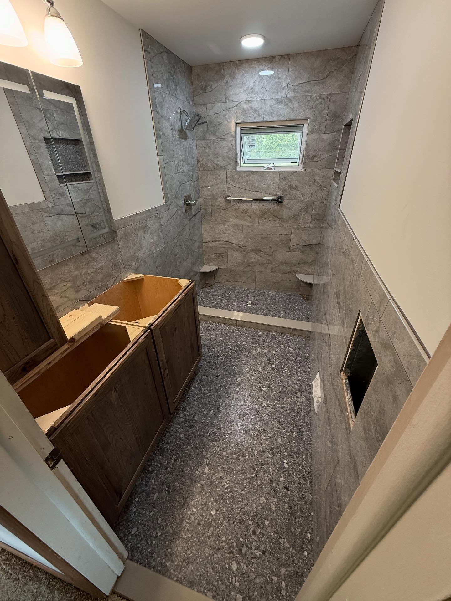 Wrapped up on another bathroom today. Can’t wait to see it when it’s all done. Some of the best customers on the planet! It’s nice when you get sent home with fresh grown food and salsa each day. Get yours today, give us a call.
#tile #kimbletile #porcelaintile #largeformattile #subway #geneseeceramictile #schluter #delta #durock #bathroomremodel #remodel #bathroom