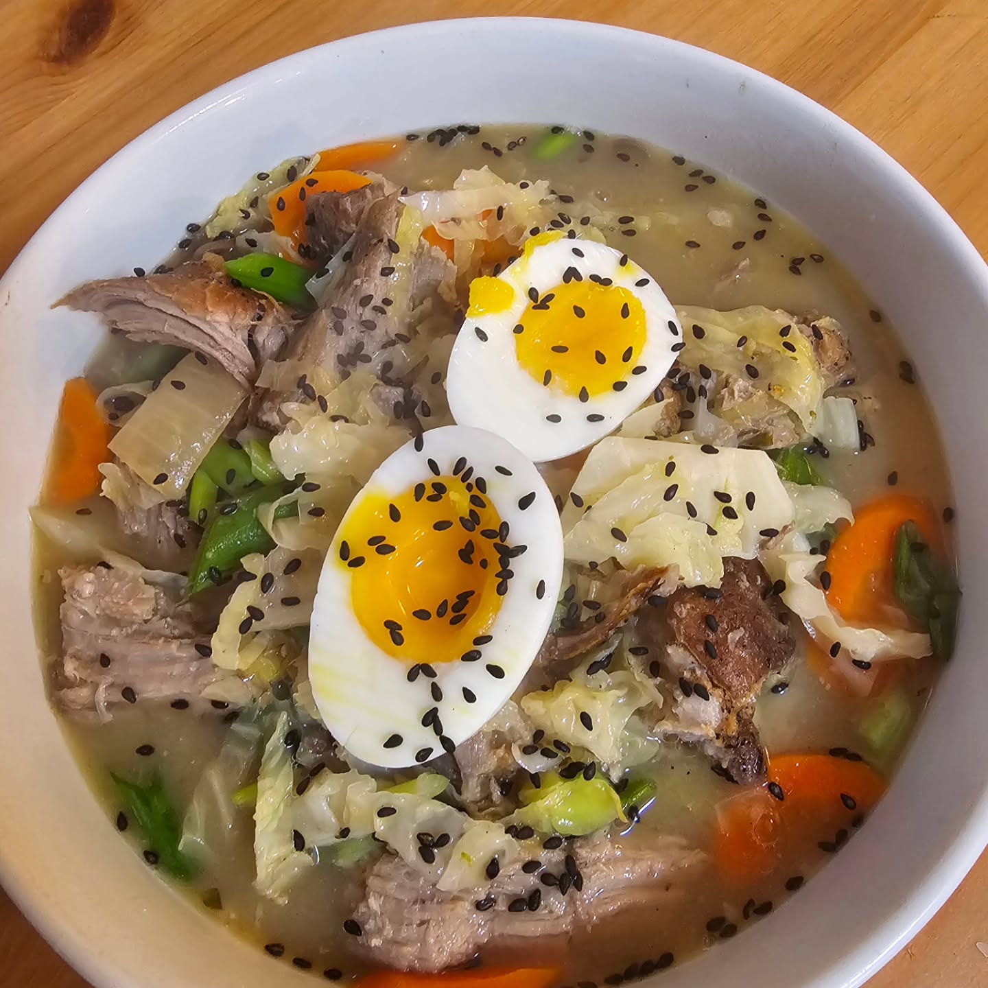 Pork Soba Noodles.
Leftovers: roast pork, soba, white miso, cabbage, carrot, scallion, jammy egg, chicken bone broth, black sesame