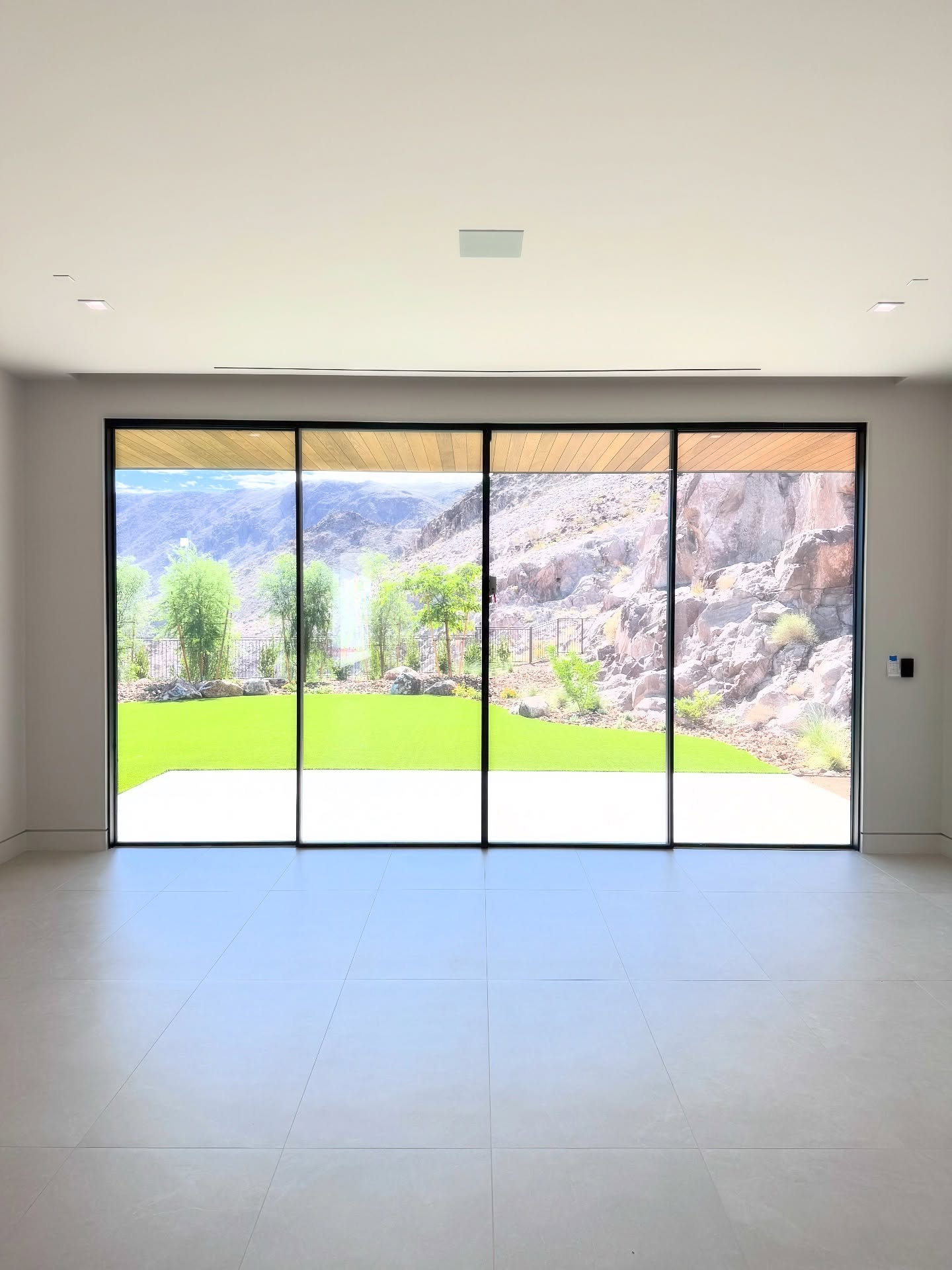 The Thinnest Center-Opening Handle Ever Conceived
*swipe left to open*
The THINLINE Series Bi-Parting Handle redefines minimalism with an exceptionally slim 1-13/16” visible profile width. Seamlessly aligned with our signature ¾” interlocking mullions, this innovation creates a barely perceptible shift in sightline—transforming what is often a point of interruption into a near-invisible gesture of design.
The result is a handle that doesn’t just perform, but dissolves into the architecture itself. The transition is so subtle it feels more like a continuation of the frame than a change in profile—delivering one of the most coveted expressions in sliding door design: an uninterrupted, fluid center opening that elevates both function and form.