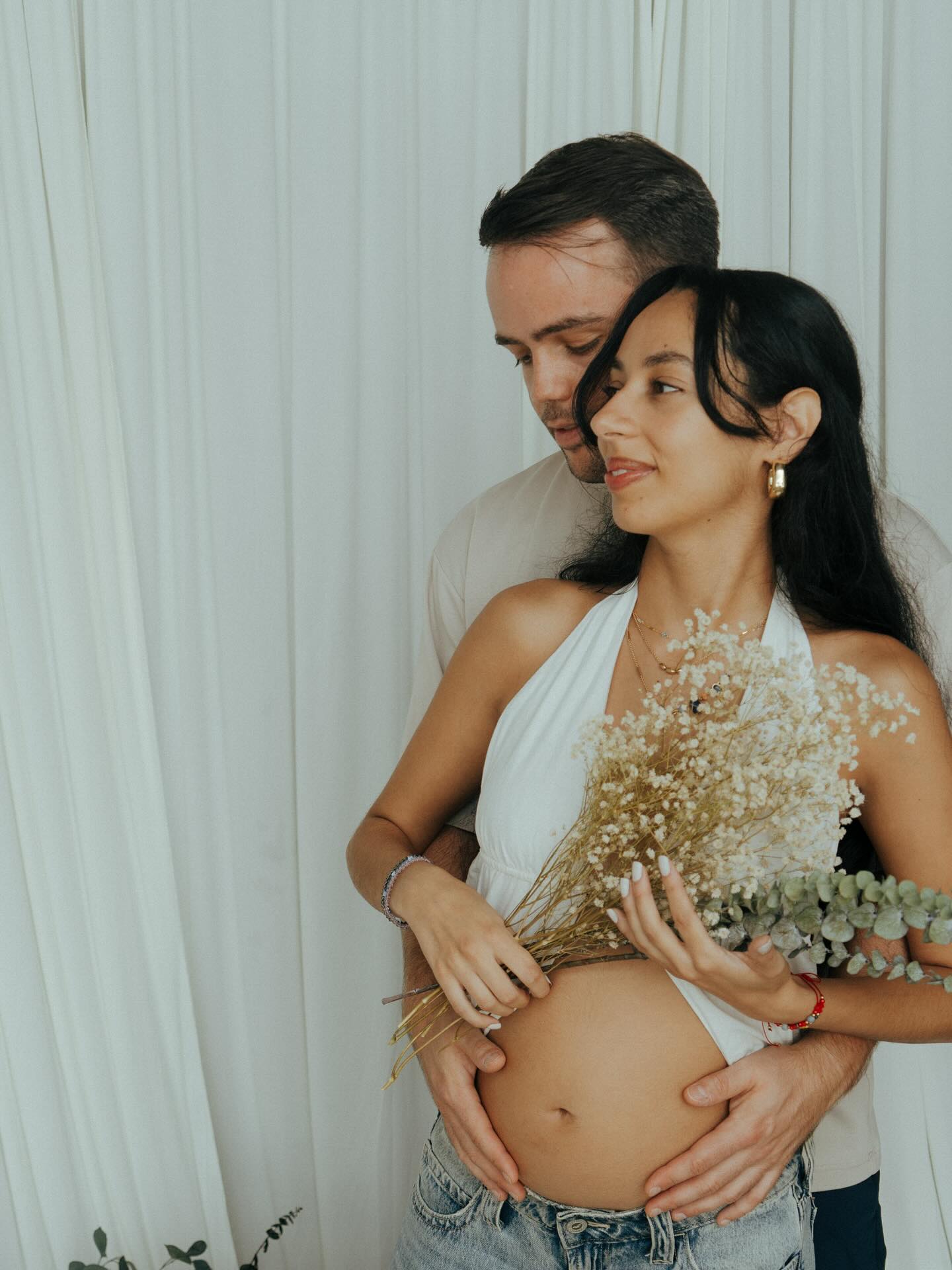 As a maiden, I always pictured myself navigating my first pregnancy sharing it all. My experiences, tips, what I eat in a day, frequent bump-dates, doubts, fears, lessons learned, you name it - I truly believed I would share and express so much to my community like I joyfully did for the past five years in my birth work, but to my surprise, it’s been the complete opposite. For years, I loved creating and sharing content on the reproductive continuum, a pure passion of mine that I still hold, but have felt little desire to express because of how un-safe the internet has felt for me.
The truth is with this pregnancy I’ve gone completely inwards, not tolerating much outside noise or feedback. This time has consisted of many social media breaks, staring off into the abyss, and finding my rhythm as my baby grows cell by cell, my belly expands, my organs shift, and my hormones sustain this new life.
It’s not until recently that I feel emotionally, physically, and spiritually resourced enough to wisely discern how I spend my time online and what I choose to share. It’s amazing how much nourishment, movement, and community can build resilience and unfuckwithable strength. Something I was not able to receive or digest just a few weeks ago.
And so when we finally feel strong, resourced, and joyful after a transformative dark night of the soul, we have a little photoshoot to capture this beautiful moment in time!!
Thank you @musestudiomia for these beautiful photos and for making something I would usually find uncomfy, feel so natural and fun 💟🫶🏼