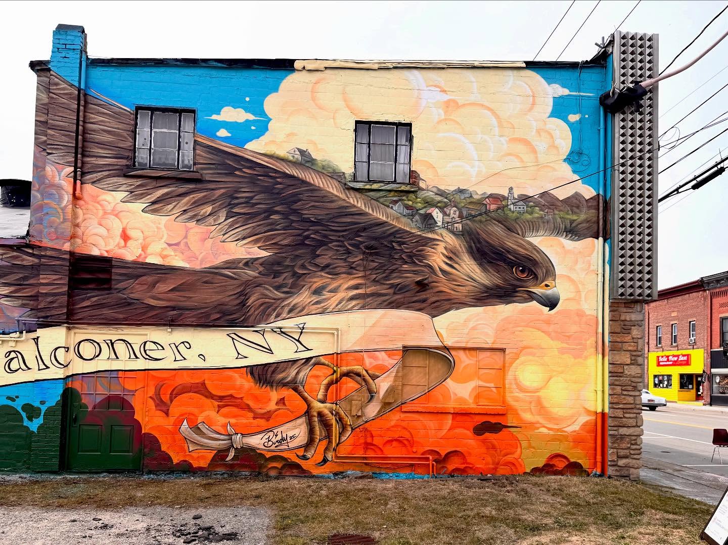 “Eyes on the Horizon” is a piece I got to create for Falconer NY. It was such an honor todo the Villages first mural! I had so much fun!!! Even though I was extremely sick the whole time- shout out to all the assistants that kicked butt and helped me push through.