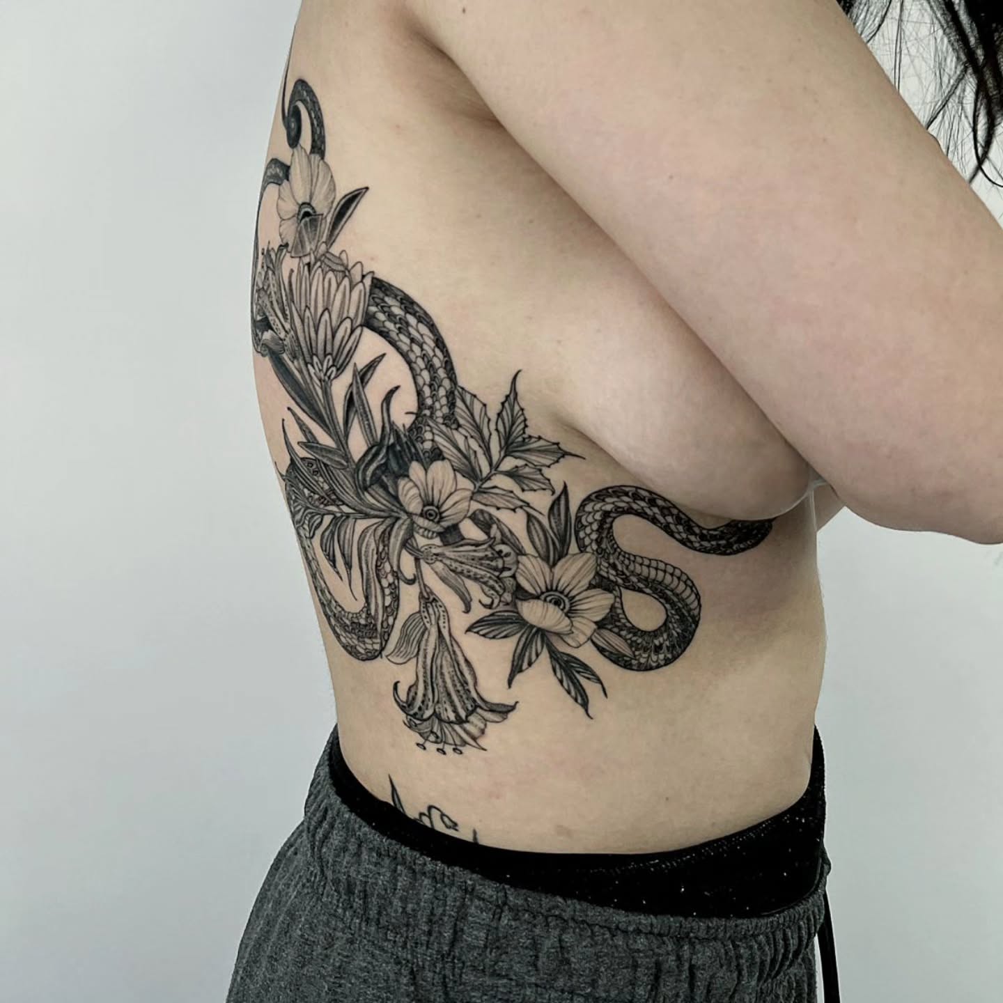 Illustrative botanical blackwork tattoo by @hiralupe_tattoo done at Future Ink Oakland California bay area
