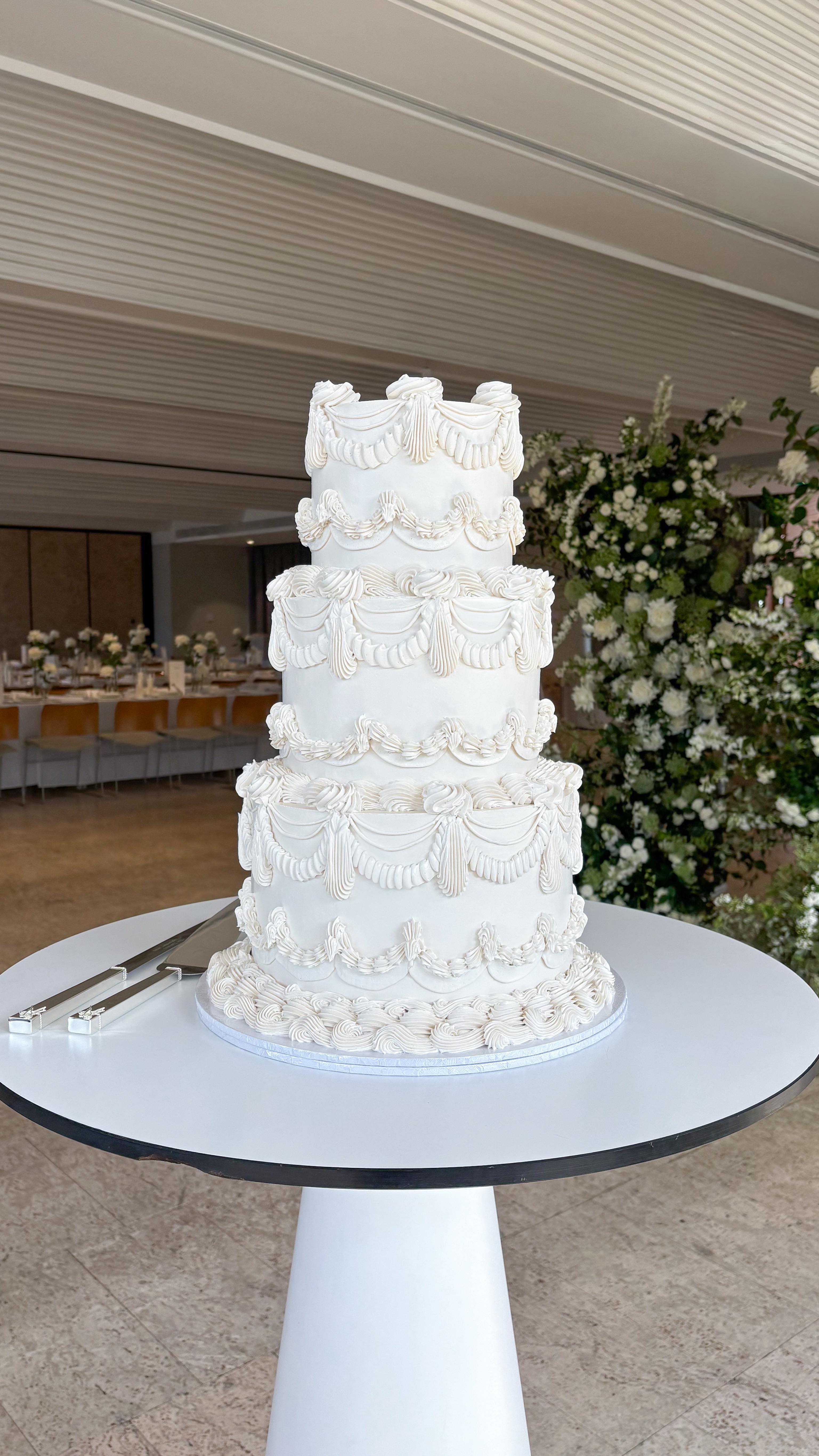 Celebrating Rachel & James 🤍
Congratulations to this stunning couple on becoming Mr & Mrs Turner ✨
Thank you for allowing me to be apart of your special day!!
Your adorable little fluffy dog making an appearance nibbling at the cake was a fun addition 🥰
Stunning venue @thecalilehotel
Gorgeous Florals @floralsandco
#thecalilehotel #kaikaicakery #brisbaneweddingcake #retroweddingcake #lambethpiping #fondantdogtopper #weddingcakeideas #whiteweddingcake #pipedweddingcake