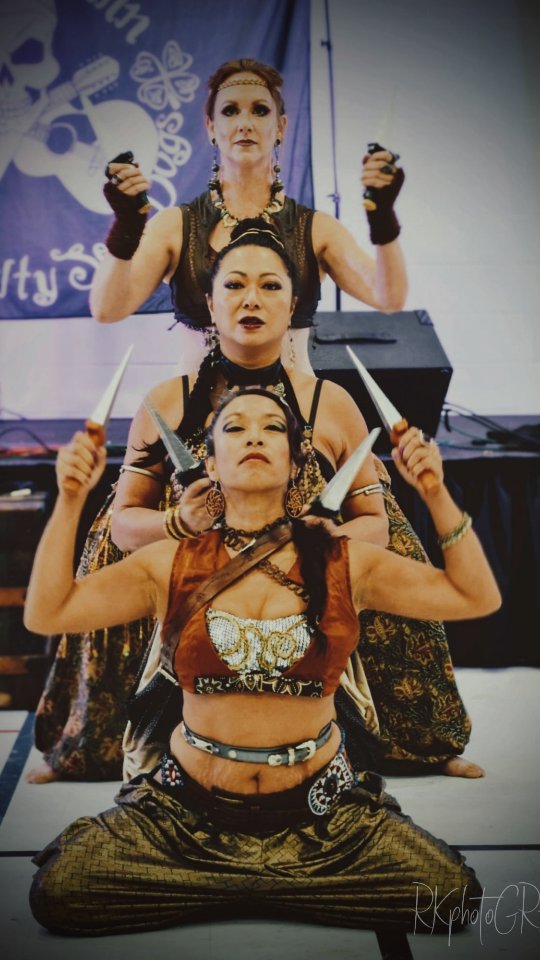 ✨ “When the witches rise, the circle grows stronger.” ✨
This past weekend at the Oxford Renaissance Festival, our coven of warrior witches conjured a path for living in our truths.
Through the dance, we called upon three fierce guardians:
🔮 The Truth Sayer — Athame in hand, cutting with precision, summoning sacred rage, and seeking nothing less than the truth.
🌑 The Boundary Weaver — staff spinning in her grasp, anchoring solid “hell nos,” protecting her peace, and standing in her power.
⚖️ The Lady of Justice — blade raised to slice away illusions and old cords, weighing the sides, restoring balance, and serving justice.
To dance with them is to remember: truth is our weapon, boundaries are our shield, and justice is our crown.
And when our audience stepped into the circle at the end, the magic doubled — fierce, fearless, and radiant. Together, we danced a celebration of power, community, and witch warrior truths. 🔥✨🌙
Cover photo by @rkphotografs
#witchwarrior #invoketress #guelph #witchesofguelph #oxfordrenaissancefestival #Invoketressdance #ishra #ishrablanco #marysnow #magic #boundaries #hellyes #hellno #daggers #daggerdance #sworddance #swordbalance #renfest renfaire