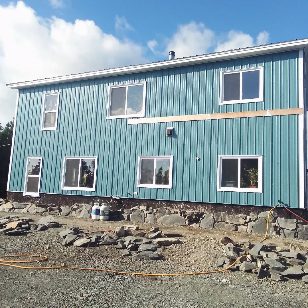 Stone skirt two thirds up and three quarters around. Still mixing!