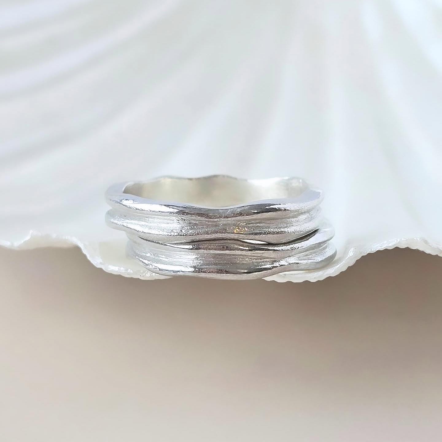 The "Ripples" sterling silver ring is inspired by the gentle movements of the sea. It has a smooth, flowing wave design that captures the serene ocean ripples, reminding the wearer of nature’s constant motion and tranquillity.
'You think you're just a drop in the ocean, but look at the Ripple effect one drop can make'
Designed for versatility, it’s perfect to wear on its own or stacked with another Ripple ring, as the wave design seamlessly fits together.
#rippleeffect #inspiredbythesea #wavering #handmadejerseyci #handmadejewelleryuk