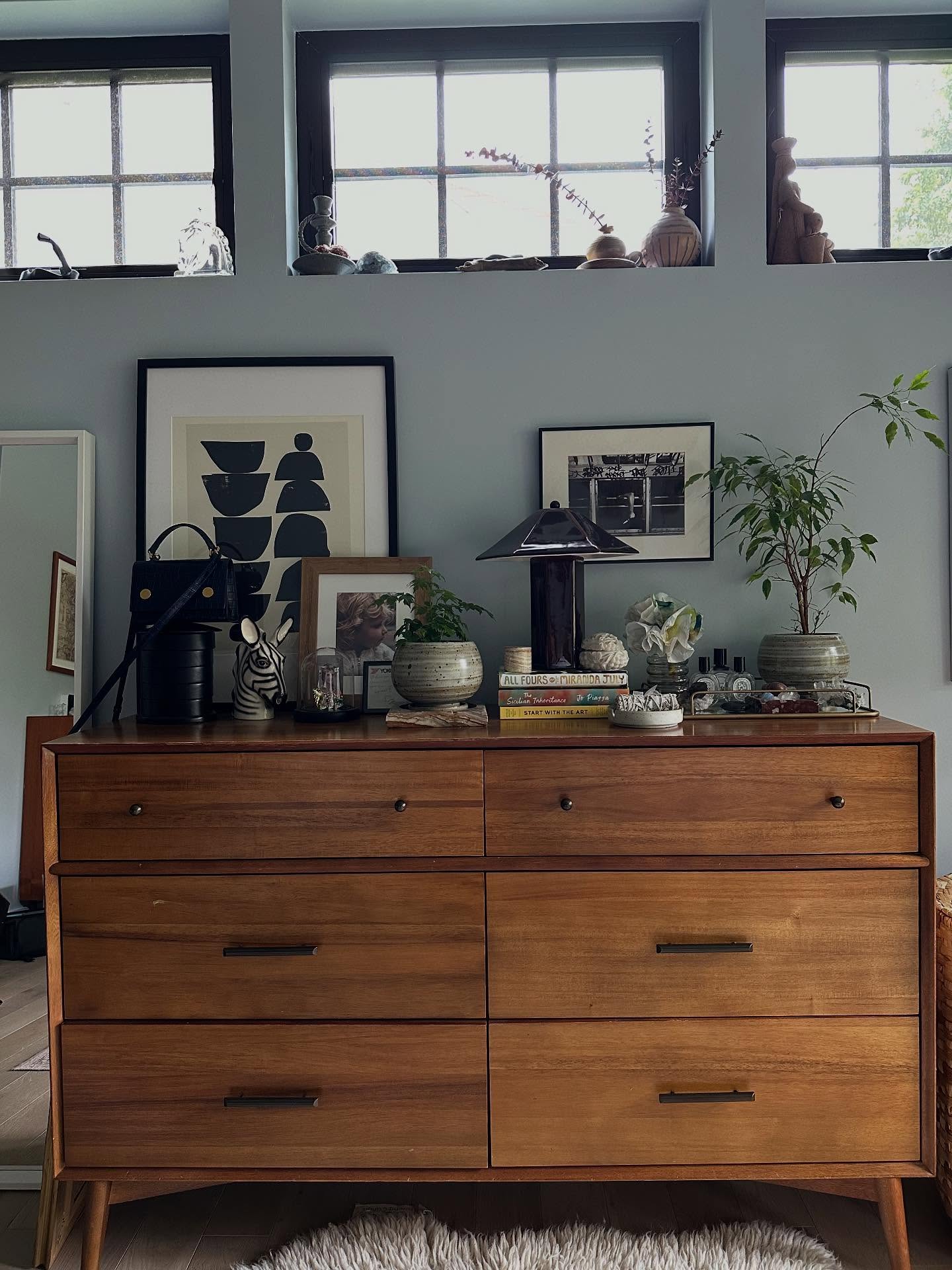 Part 2 of the bedroom. Still love, love, loving this blue from @benjaminmoore 💙
Minimalist I am not. Plant lover I am! More the better I say- either small or large, I like to cover a room in greenery to add depth, color, texture and let’s not forget, some purified air!
Windows are dressed in linen curtains and woven wood shades- again, bring in that texture for interest.
This is so personal- everyone getting to see my bedroom!
Oh did anyone spot the viral @target lamp?
#InteriorDesign #HomeDecor #BedroomDesign #InteriorStyling #DesignInspo #hudsonvalleyinteriordesign #shanalutherinteriors