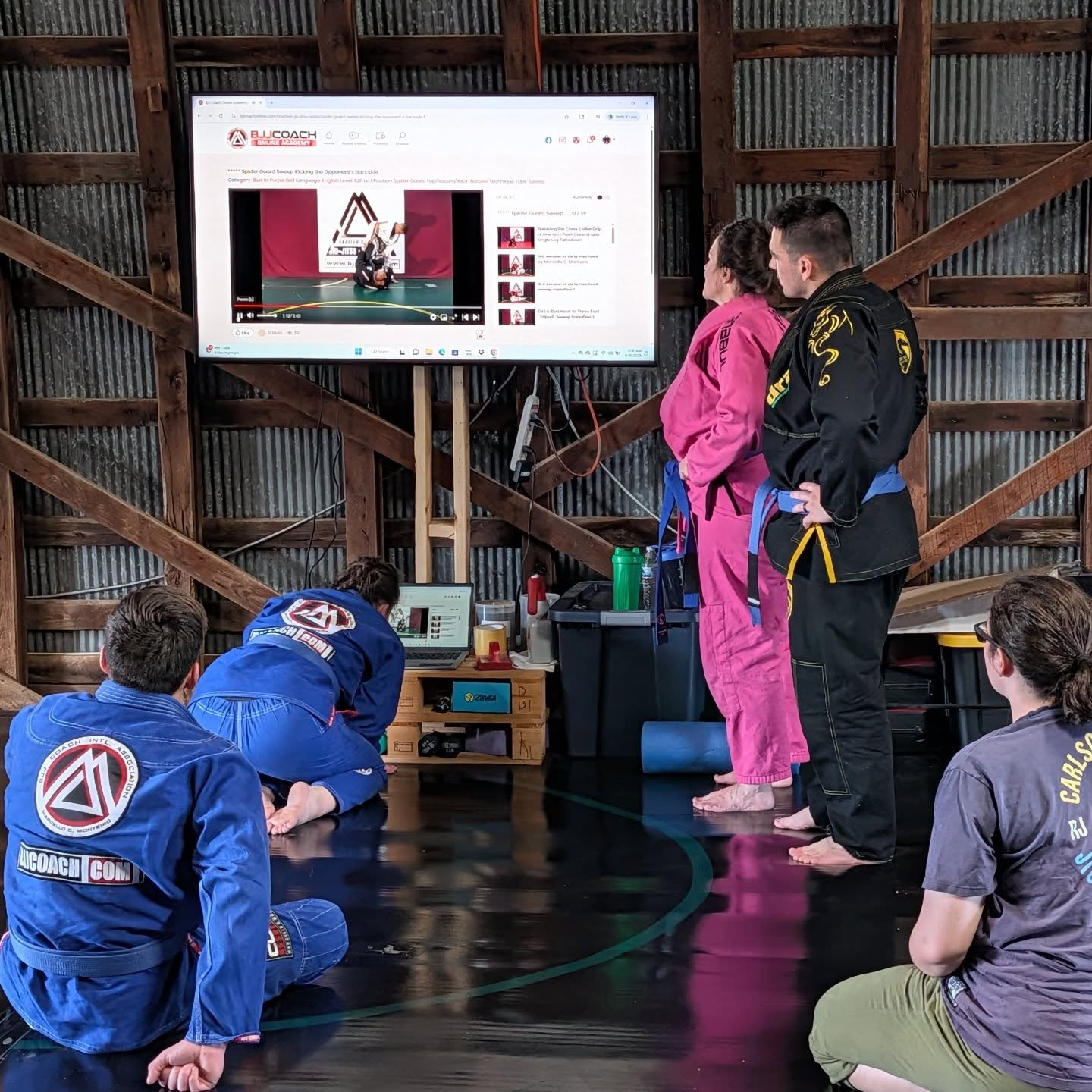 Getting in the morning dose of @bjjcoach_intl_assoc as the two in blue prepare for tournament this weekend! @bjjcoach_online #huntsurvival #campcraftoutdoors