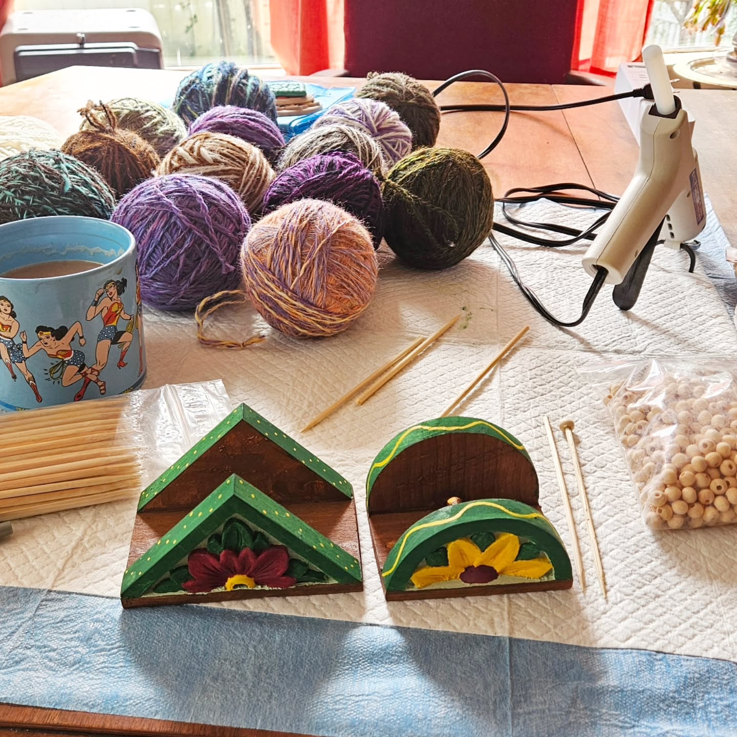 A partially productive morning. On Saturday, friends came over for a bit of a work day and then board games. We wound 14 ball ornaments, started painting a few spindle whorls, and I finally painted my new business card holders!
This morning, I finished the touch-ups on the holders and had planned to cut and assemble the knitting needles for the ornaments, but the skewers are too big for the wood beads. Aargh! New skewers are on the way. Hope they work better.
Back to working on other ornaments after lunch.
.
#ornamentsallyear #woolornaments #ballornaments #handspunyarn #businesscardholder #smallbusiness #diy #yarnlove #handmade