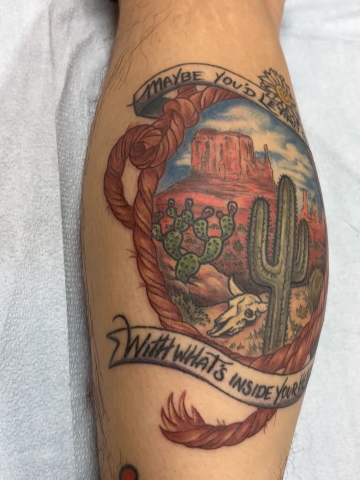 Beautiful western scene with lyrics from the song Hexie Mountains by @orvillepeck for my bestest friend in the whole world @hotlikesriracha 🌵🏜️Mostly healed with small touch ups!! Thank you Kai for your continued trust and for being my biggest fan 🤠❤️🤡 #tattoo #orvillepeck #orvillepecktattoo #western #yeehaw #desert #desertattoo #westerntattoo #cactus #colortattoo #cowboy #cowboytattoo #queertattooartist