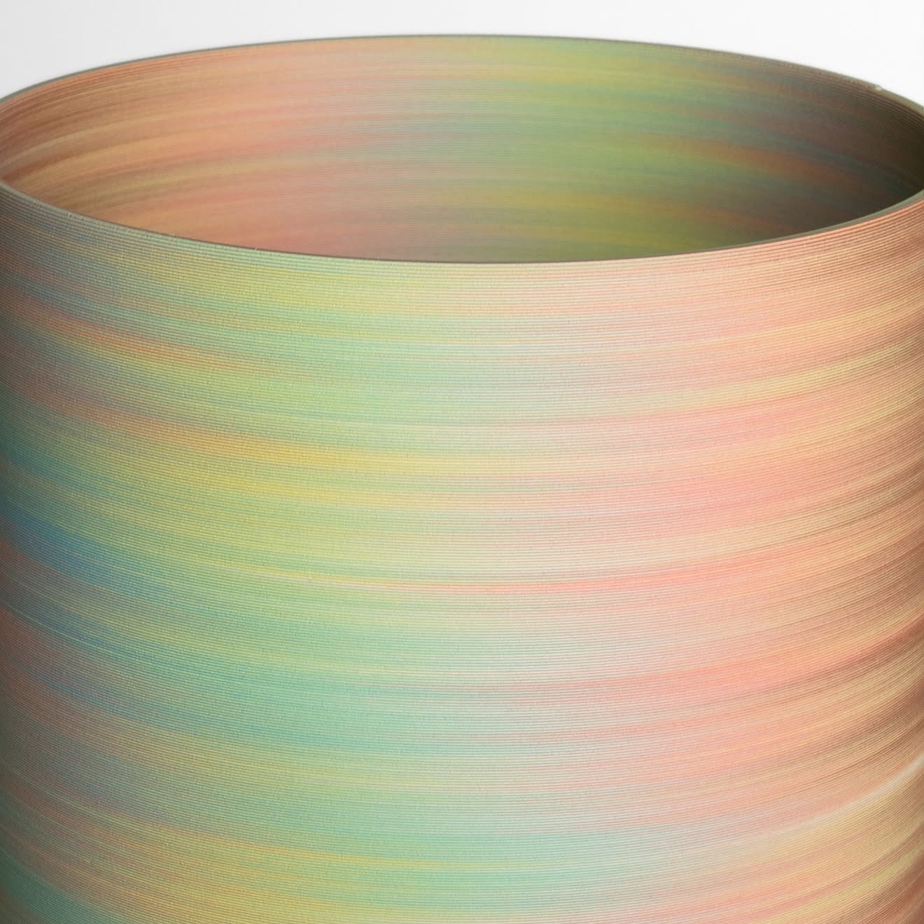 Olivier van Herpt is the pioneer of 3D Ceramic digital fabrication technologies. He collaborates with the machine and clay to craft the most beautiful cermamic vessels.
Since 2014 he has been tinkering, experimenting and refining the use of 3D printed clay . His innovations are not only in the 3D printing technique but also in clay recipes, extruding clay, drying and firing methodologies. Each object can take weeks to perfect, with numerous attempts.
His latest creations uses his self-developed technique, ‘The Colorful White’. It is a new approach to colouring ceramics which maintains the tactility of the surface texture which is normally lost when glazed. Unlike the traditional glazing process, this method involves applying colour only to the exterior of the raw clay filament prior to shaping/printing.
@oliviervanherpt
#3dprintedclay #3dprintedceramics #3dprint #clay #ceramics #ceramicartist #ceramicsculpture #claycraft #material #materiales