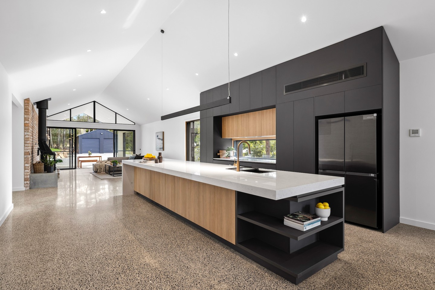 The heart of this Dales Creek home is the open-plan kitchen, with a five-metre island bench, slim profile appliances, and a layout built for both function and flow.
Design by @bradhooperarchitect
.
.
.
.
.
#buildtrend #buildtrendhomes #masterbuilder #sustainablebuilding #victorianbuilder #macedonranges #macedonrangesbuilder #interiordesignmelbourne #australianarchitecture #architecturevictoria #kyneton #woodend #macedon #mountmacedon #gisborne #riddellscreek #romsey