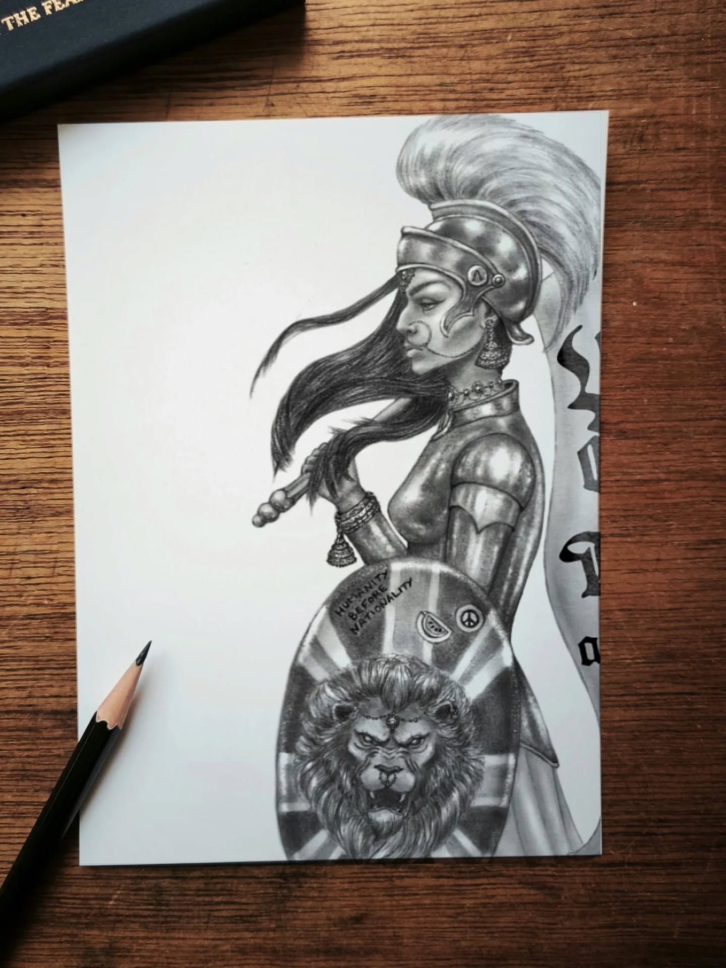 I am Great Britain.
Graphite pencil on textured paper.
The etched message on the shield reads 'humanity before nationality'.
Prints will be available soon ✊
#britishartist #selondonartist #antifascist
#antiracist #powertothepeople #unclescornershop
#desiart #browngirlart #britishasianartist