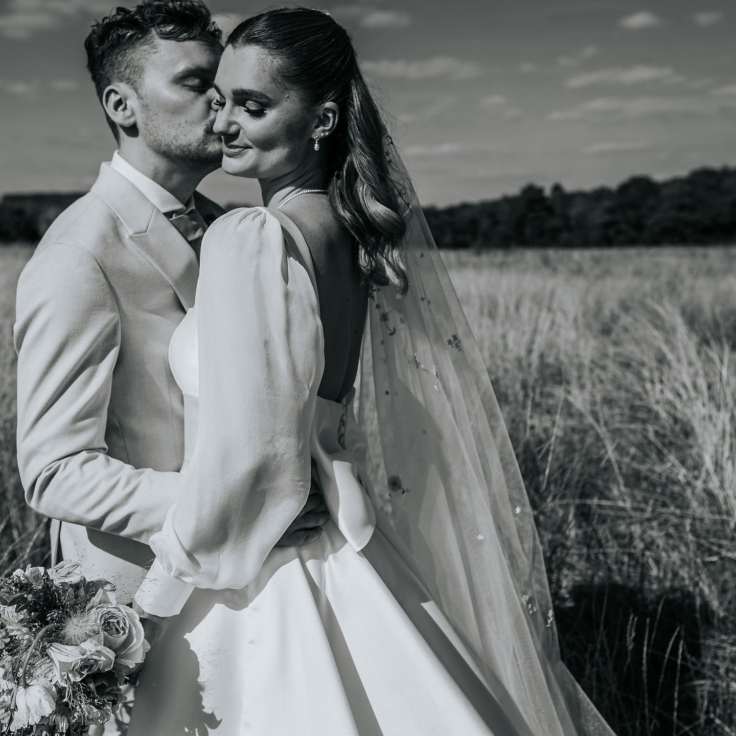 Sabrina & Jasper’s wedding took place in late summer @farbridgeevents . Sabrina wore a bespoke satin ballgown from our classics collection @fredabennet . We created a bespoke detachable silk sleeve and satin bow to create the perfect dress. Sabrina elevated her look with the addition of burgundy velvet shoes and a floral embroidered veil. Perfection 👌🏻
Congratulations to Sabrina & Jasper wishing you a lifetime of love and happiness.
Venue: @farbridgeevents
Photographer: @lucy_davis_photography
Bridal Boutique: @mayandgracebridal
Florist: @wildhector
Band: @richardhadderz
Hair @natashachanelhair
Make-up artist: @sophiajanemua
Magician: @martinsandersonmagician