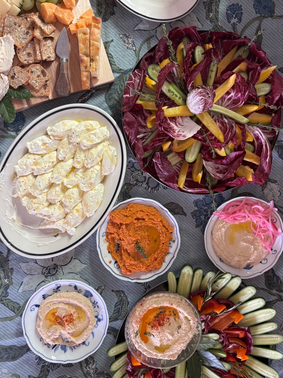 The spread I made for Finleys birthday brunch which included
- whimsical crudite and dips like hummus, roasted carrot pepper, and whipped ricotta
-kimchi risotto arancini
-sourdough focaccia with selected meats and cheese
-elote salad
-smashed cucumber salad
-potato onion frittata (not pictured)
-birthday cake
-cantaloupe spritzes
Orders open! DM or email me