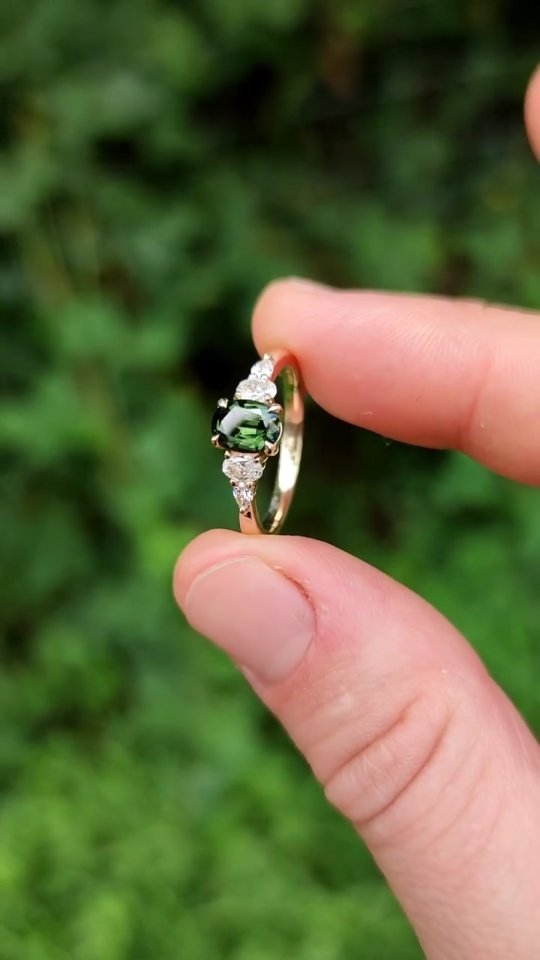 The most mesmerising dark green sapphire in this Naia engagement ring ✨