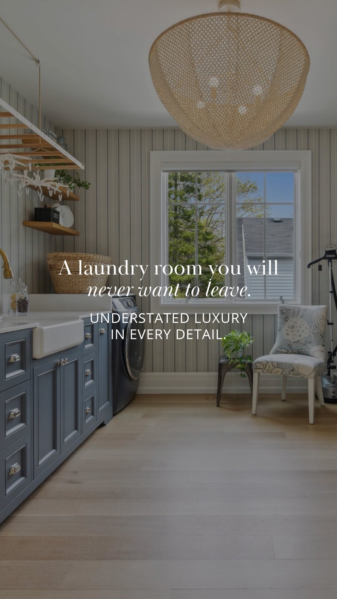 ☝🏼A true dream laundry room - this exquisitely designed space is as beautiful as it is functional.
With 9’ ceilings & a statement Palecek Quinn chandelier, even daily routines feel elevated. The custom cabinetry offers thoughtful storage, featuring 4 integrated hampers, 18 rift-sawn oak drying racks, farmhouse sink with brass spray faucet & a George and Willy pulley system for hanging items with ease. Finishes include a sapphire blue washer and dryer, steam closet, bespoke wallpaper, smoked glass maple barn doors with gold hardware & rift-sawn solid oak floors for a seamless, elegant flow.
Every detail is curated for utility, comfort & understated luxury… all that makes daily routines feel luxurious.
#laundryroomgoals #interiordesigninspo #laundrybutmakeitluxury #oakvillehomes #laundryroomdesign