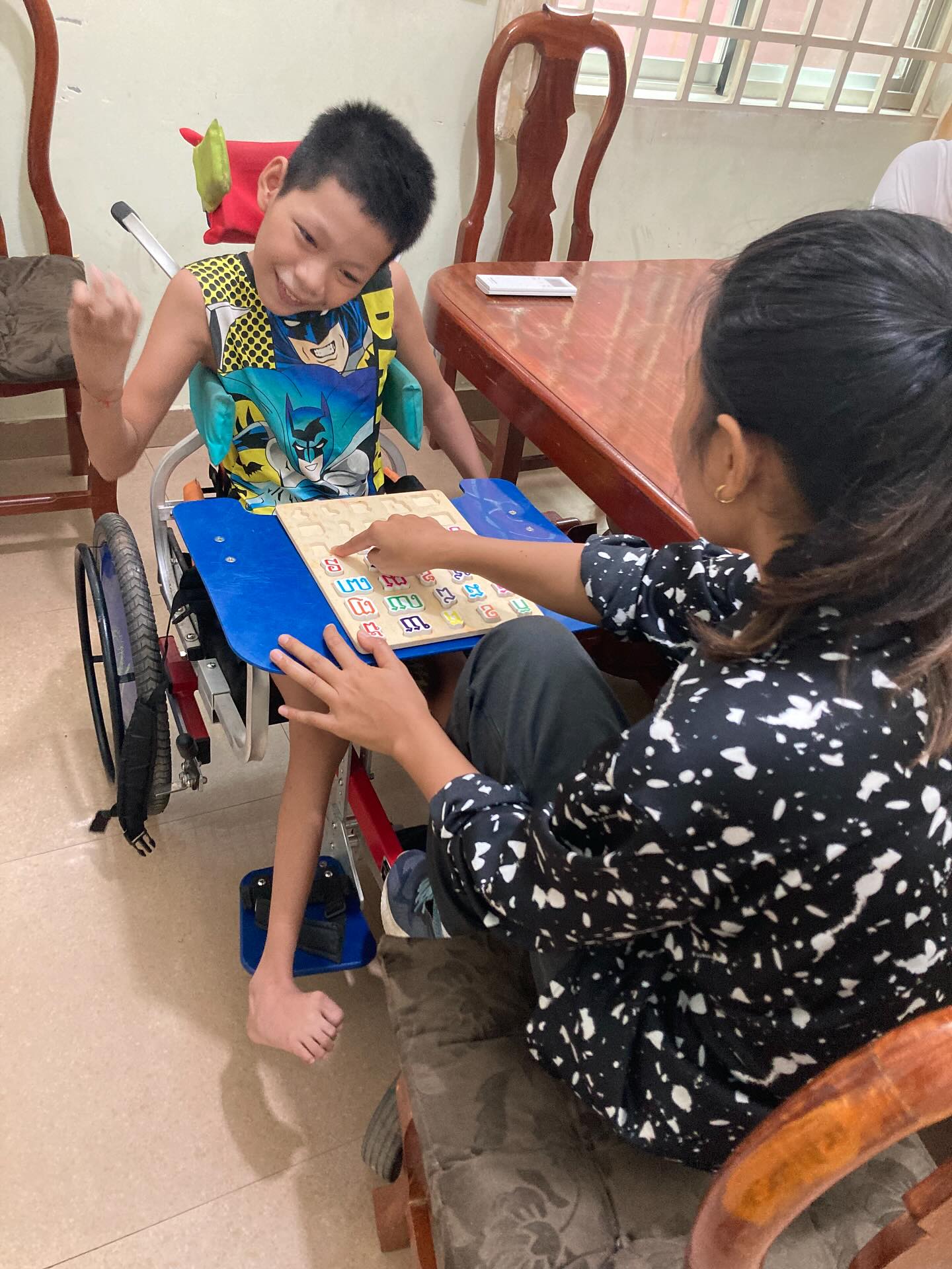 Sophy has been on staff with us since day 1 in 2020 and she’s GREAT at displaying God’s love and hope to our clients and their families 💕 One of her favorite things is helping kiddos who can’t attend school because of their disability learn the Khmer alphabet!