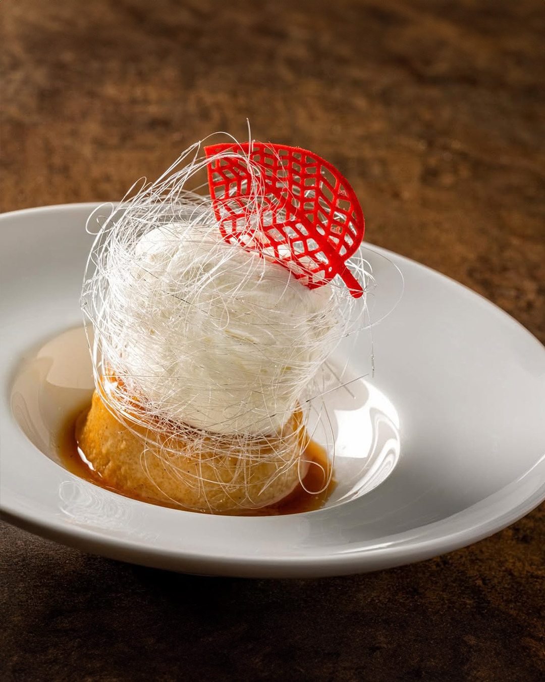 Hidden behind a vast wooden door and palm-leaf thatched wall in Santo Domingo, Ajualä (@ajualard) is the restaurant reshaping the Dominican Republic’s culinary landscape with creativity, heritage, and a profound respect for local produce.
Helmed by Venezuelan-born, Paris-trained chef and co-owner Saverio Stassi, this modern space blends an elegant dining room with an open-air terrace, setting the stage for a gastronomic journey rooted in the island’s diversity. With 90% of the ingredients sourced locally, the menu bridges Caribbean, Italian, and South American flavors.
Guests can explore either a tasting menu or an expansive à la carte selection of sharing plates, complemented by an extensive wine program offering over 100 options by the glass, inventive cocktails, and even nostalgic local favorites like Malta India and Coco Rico.
This is more than a restaurant, it’s a celebration of Dominican identity, craftsmanship, and cultural heritage, where every dish tells a story of tradition reimagined through a contemporary lens.
#LeBoulevardierTravel
#LuxuryTravelAgency
#BoulevardierLife
#Ajuala
#SantoDomingo