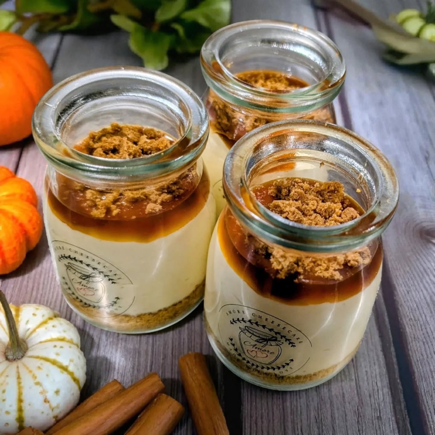 Pumpkin Spice Cheesecake.
Limited Time Fall Flavour!
Graham cookie crust, creamy pumpkin cheesecake, topped with caramel syrup and crushed ginger snap cookies.
#pumpkinspicecheesecake #cheesecakejars #gingersnapcookies #dessertjars #amorecheesecake #thanksgivingdessert