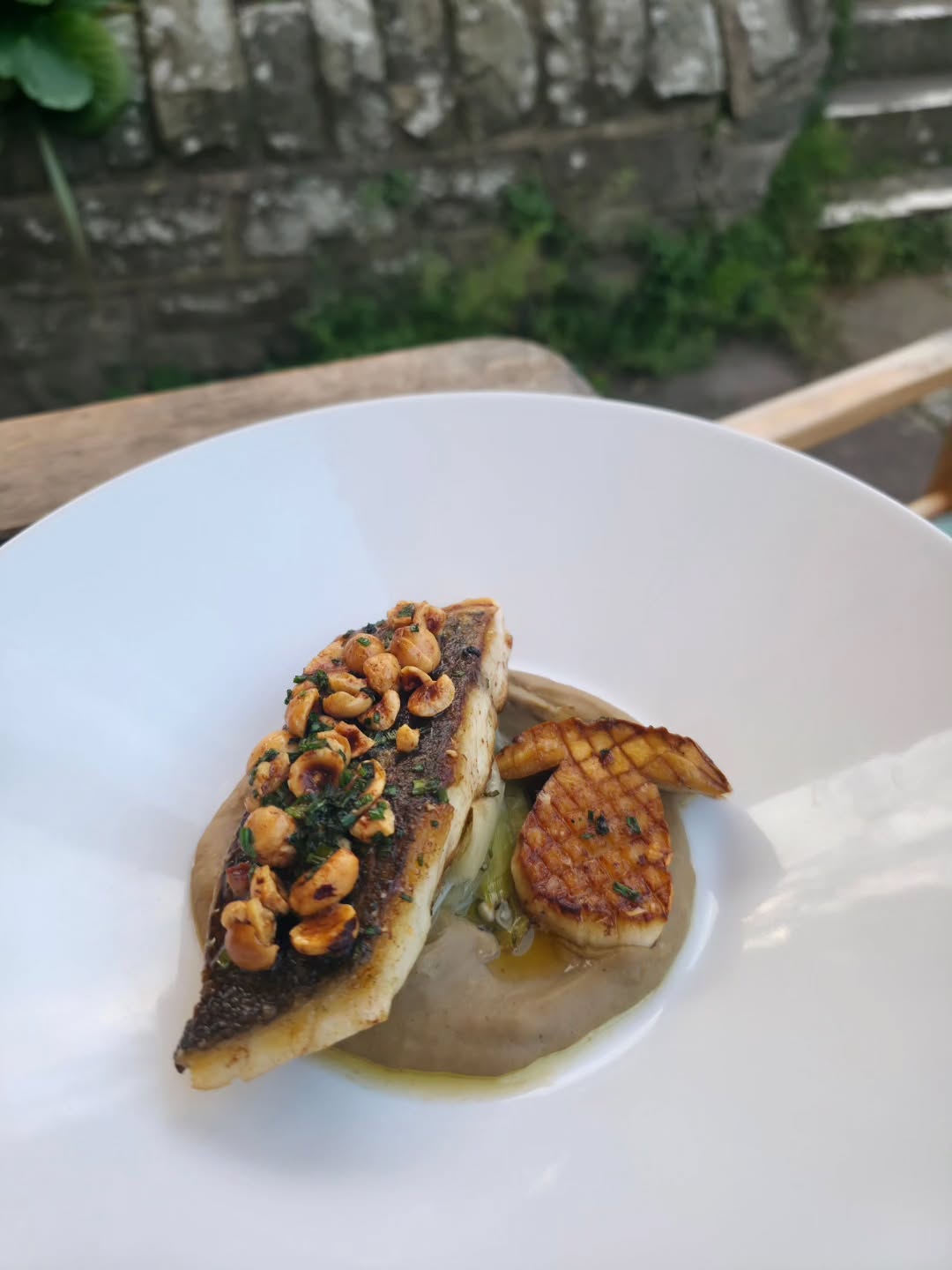 Stone bass, roast cep, confit leek, hazelnut, lemon & chive butter